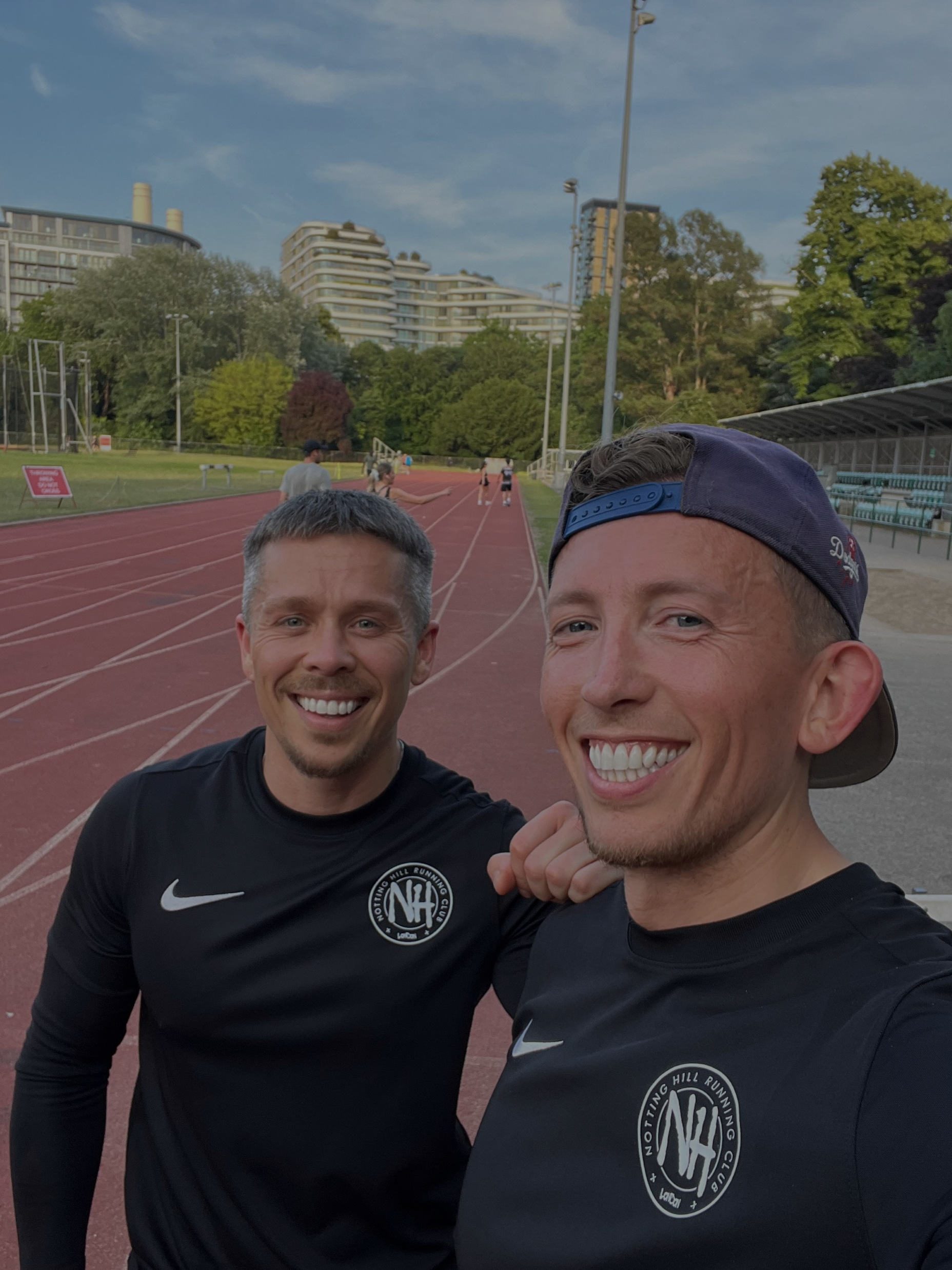 Two Notting Hill Running Club members during a track workout.