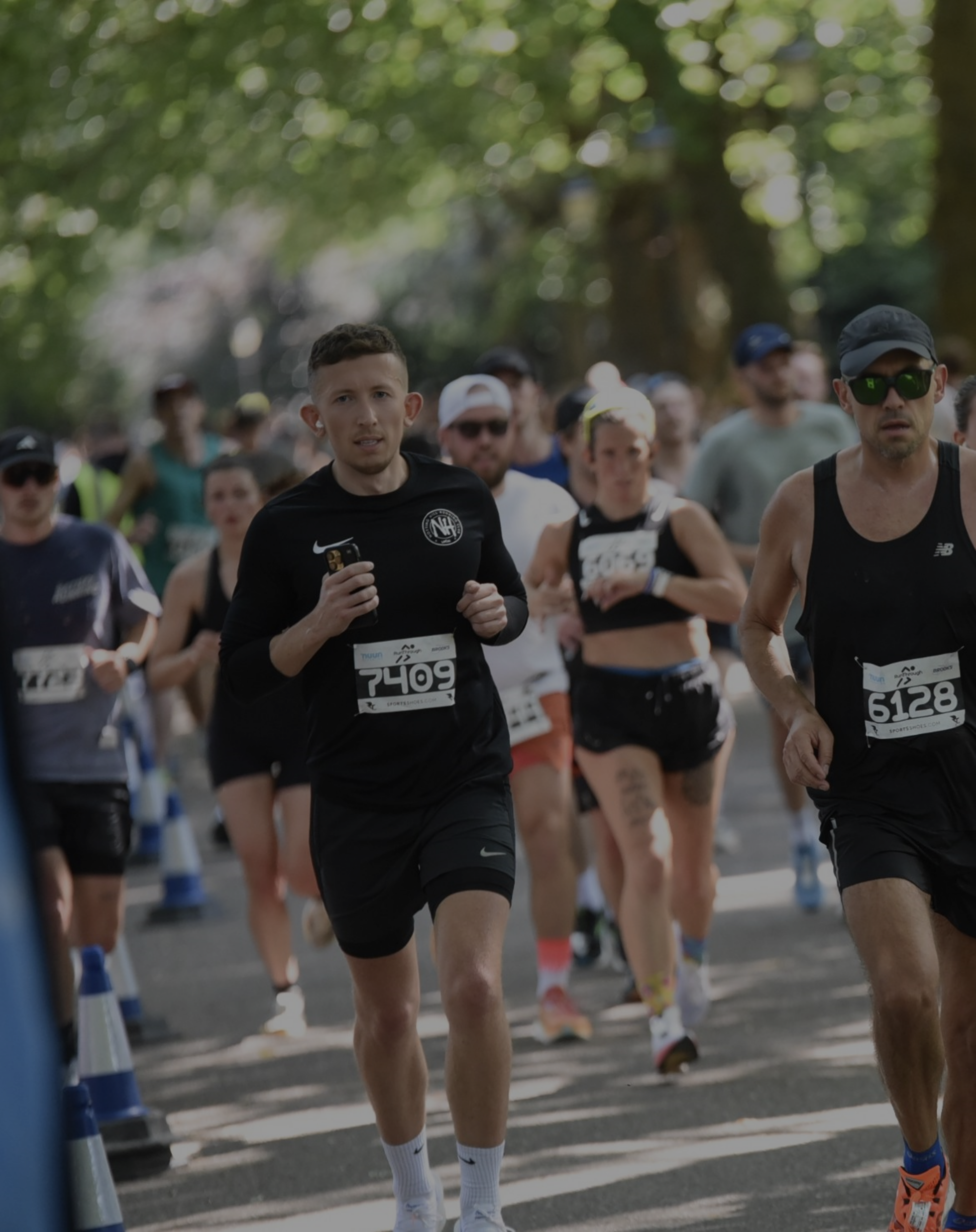 A Notting Hill Running Club member running during a race.