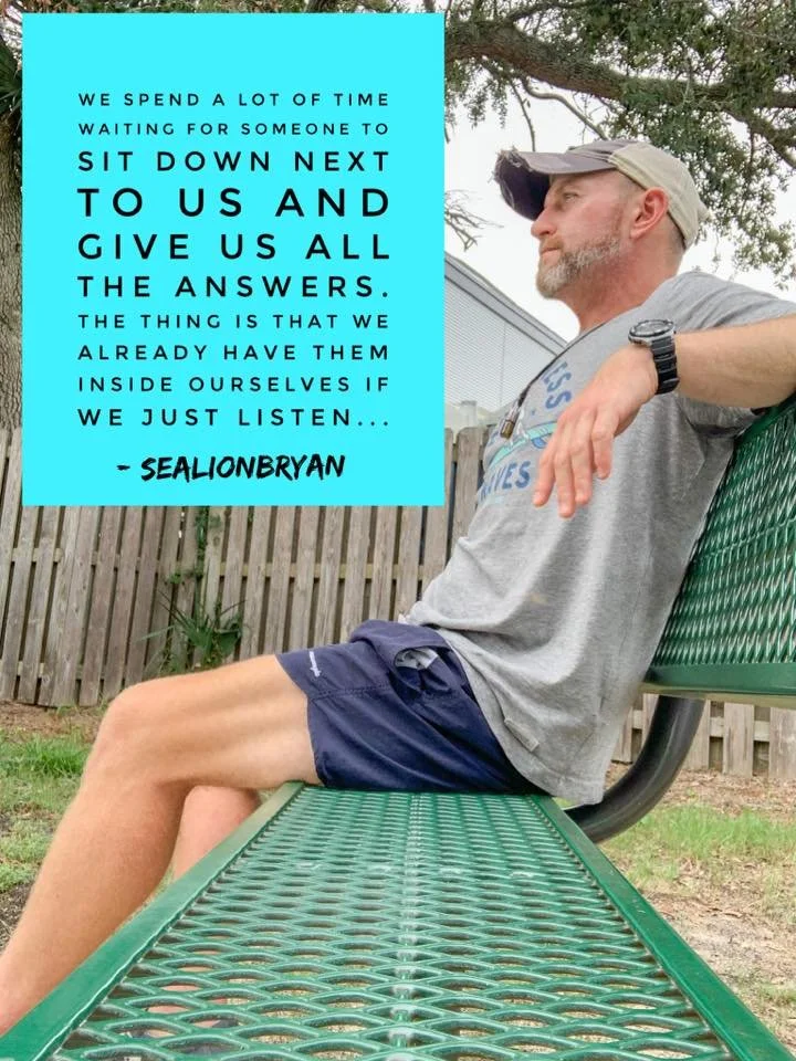 A man sitting on a green outdoor bench with a fence and trees in the background. He is looking to the right, wearing a gray cap, gray shirt, shorts, and a wristwatch. A quote about listening and self-awareness is overlaid on a blue block of text.