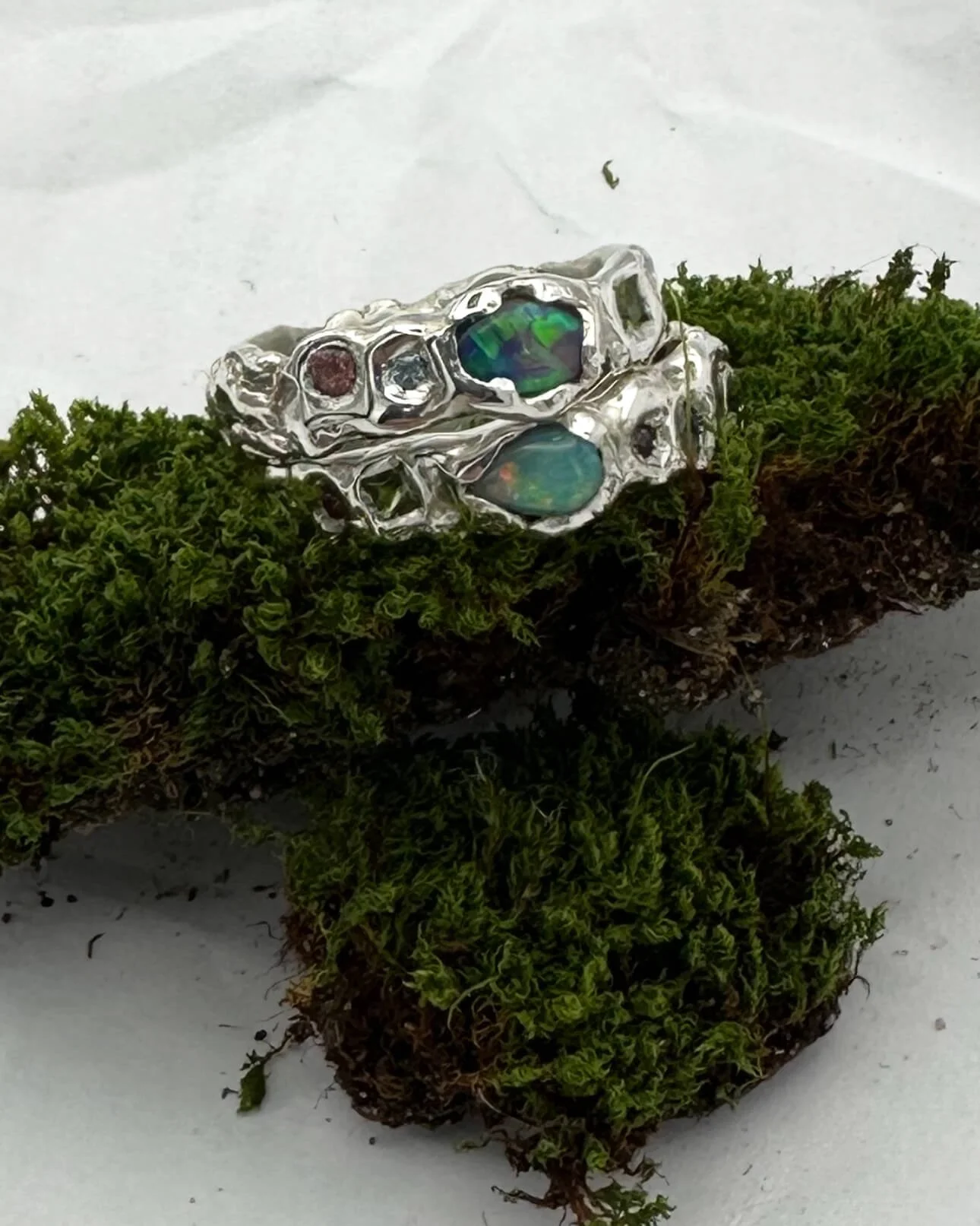 DK Twisted Terrain Rings with black opal eyes for Georgia & Wesley