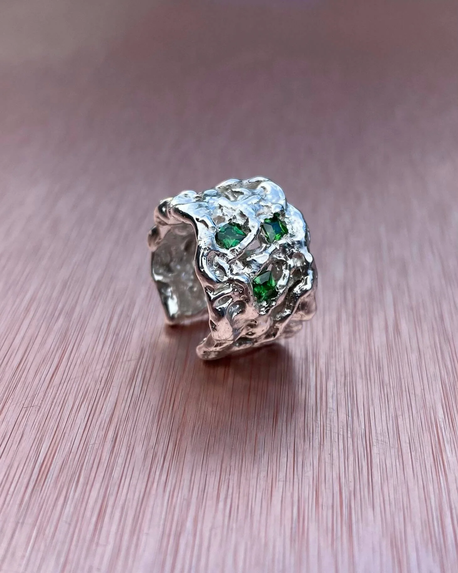 silver thick cuff emerald.jpg