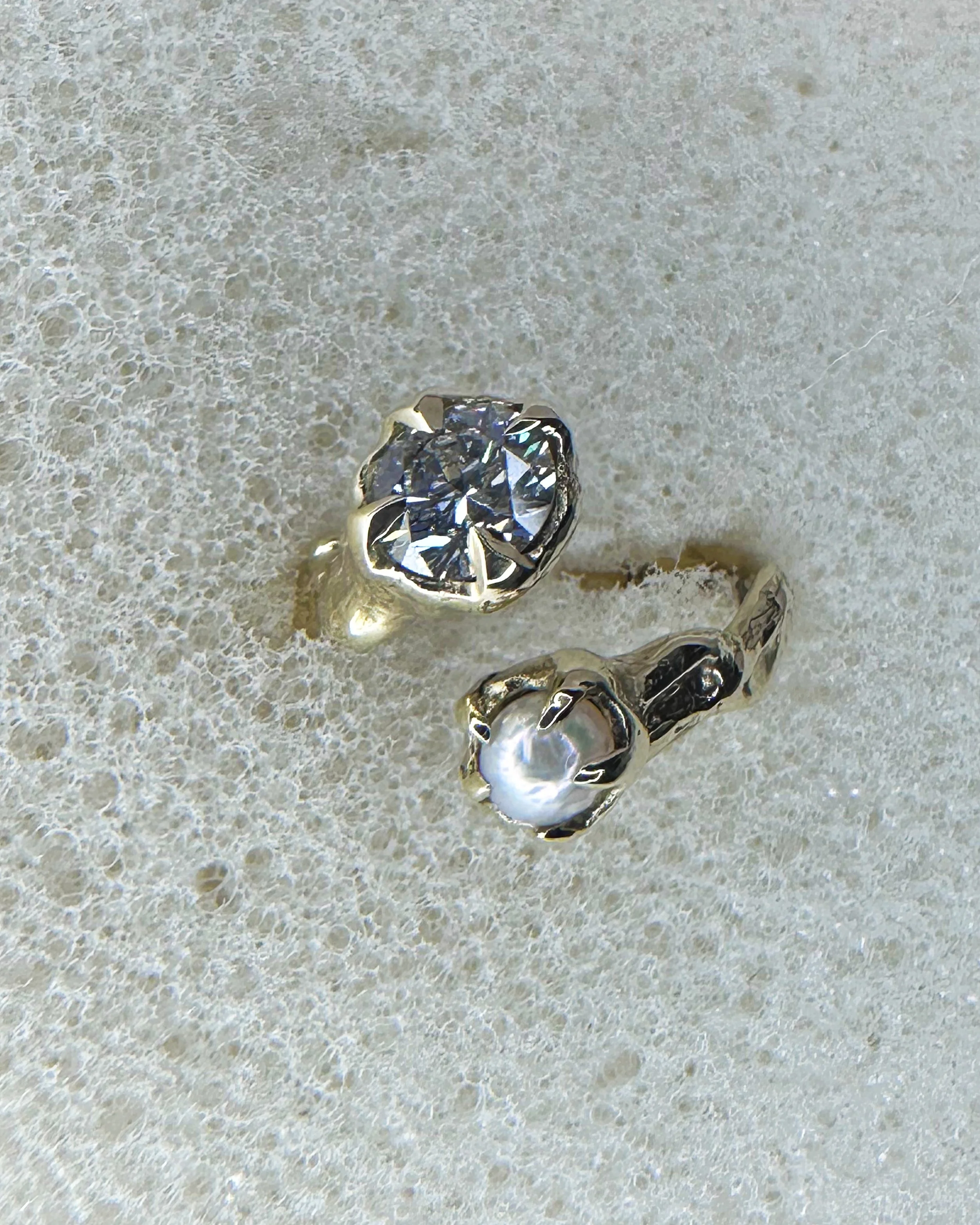Diamond & pearl engagement twist ring