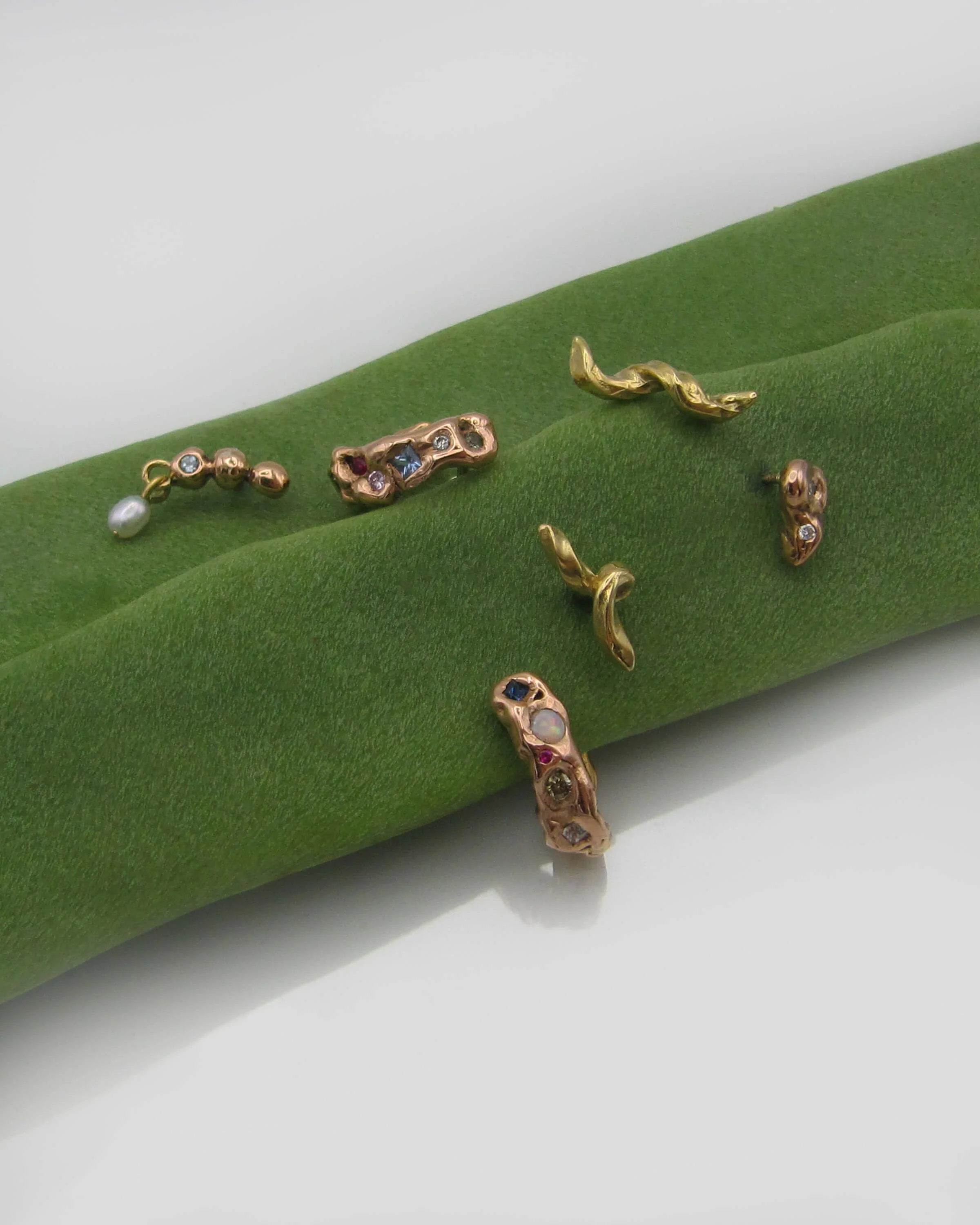 6-piece earring cartography for Gina's geographical journey