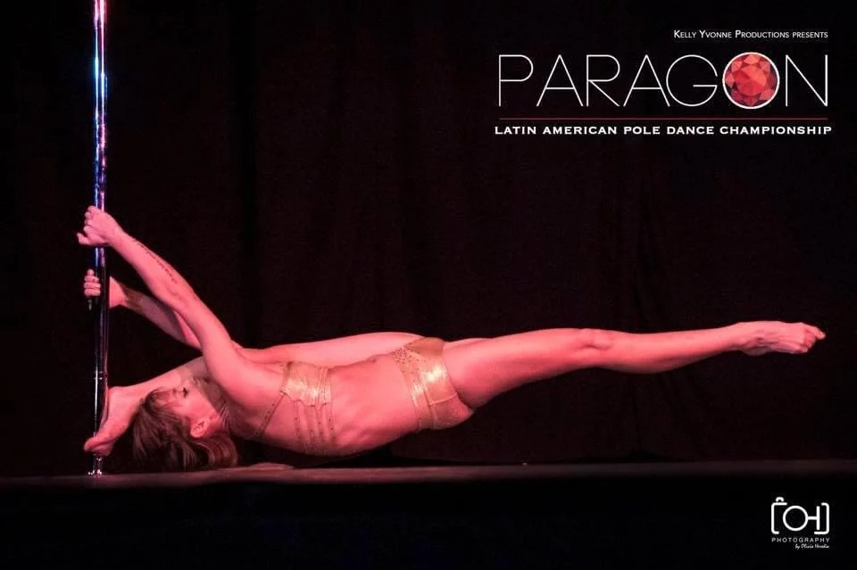 Pole dancer performing a move during the Paragon Latin American Pole Dance Championship.