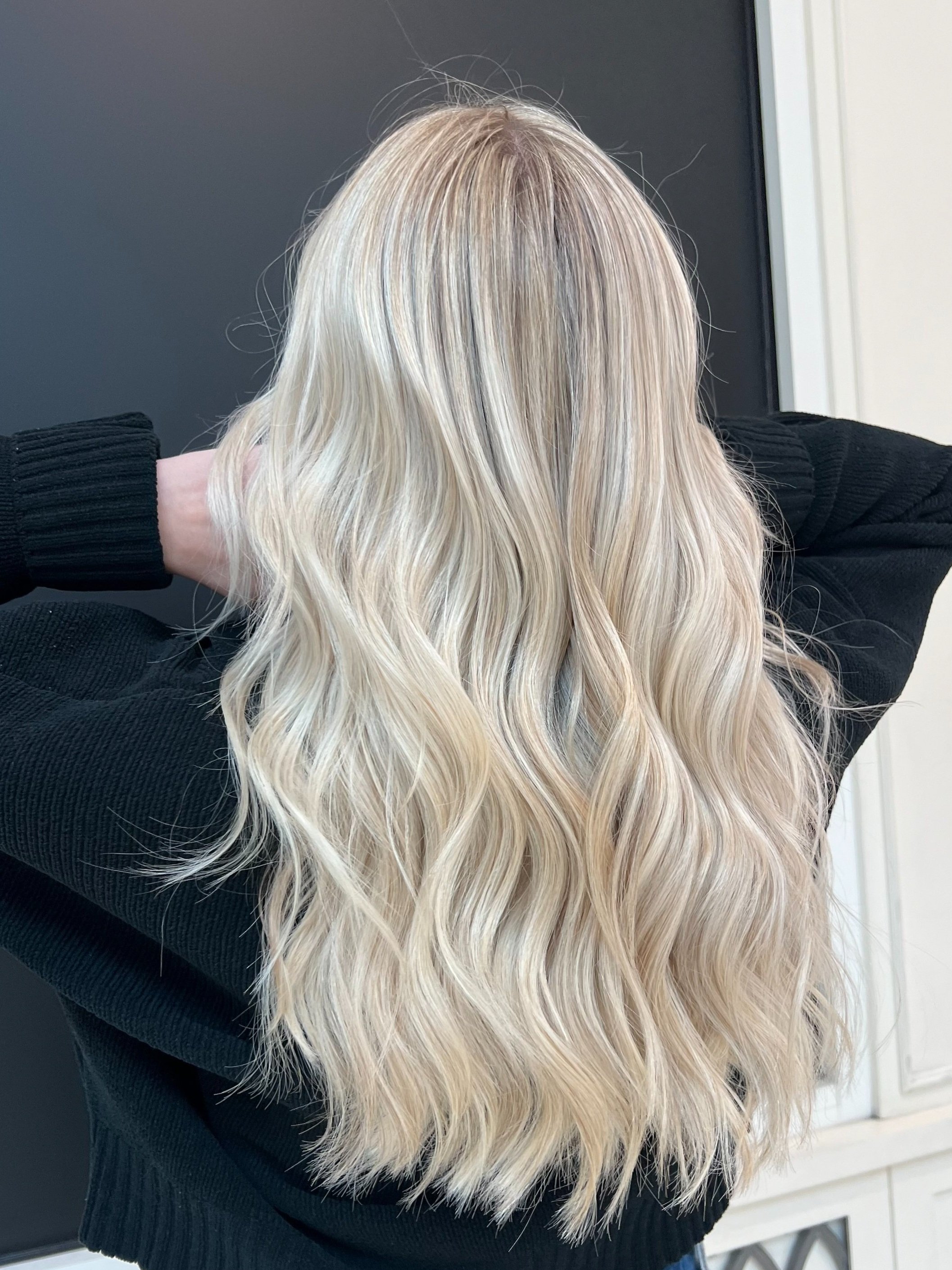 girl with bright blonde hair and highlights long hair
