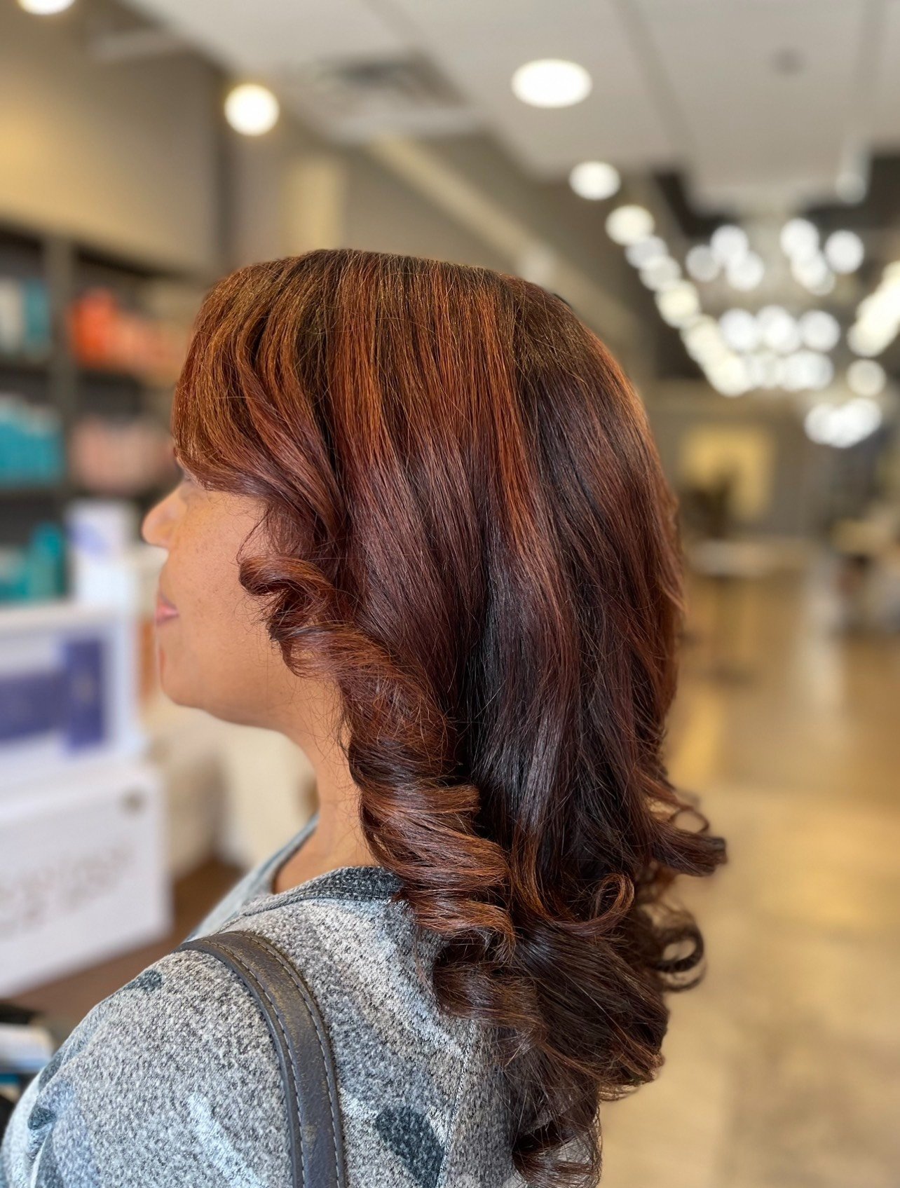 black woman with red highlights