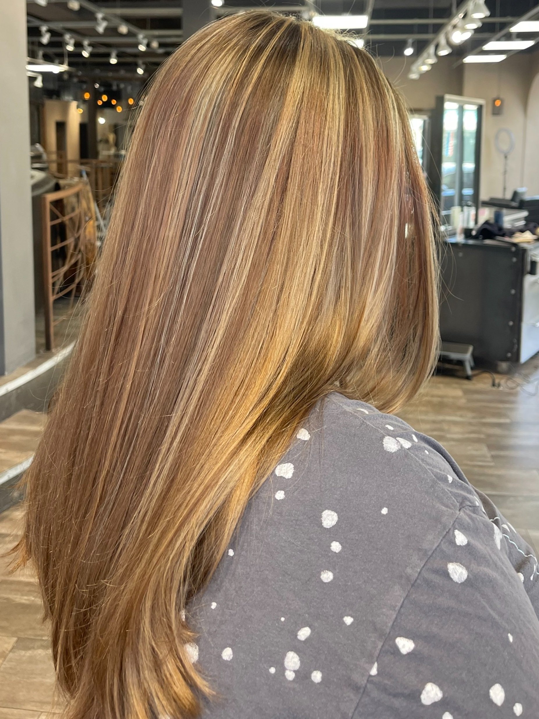girl dark blonde hair with highlights