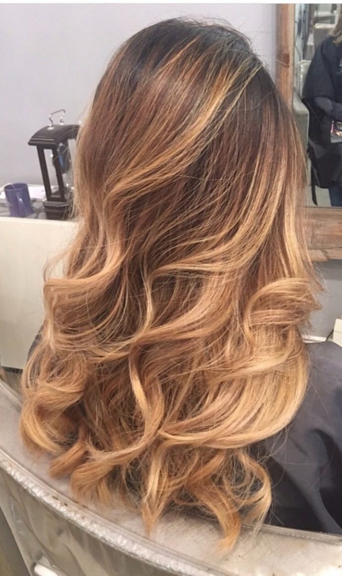 girl with dark blonde balayage