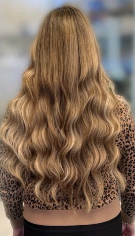 girl with blonde hair extensions long