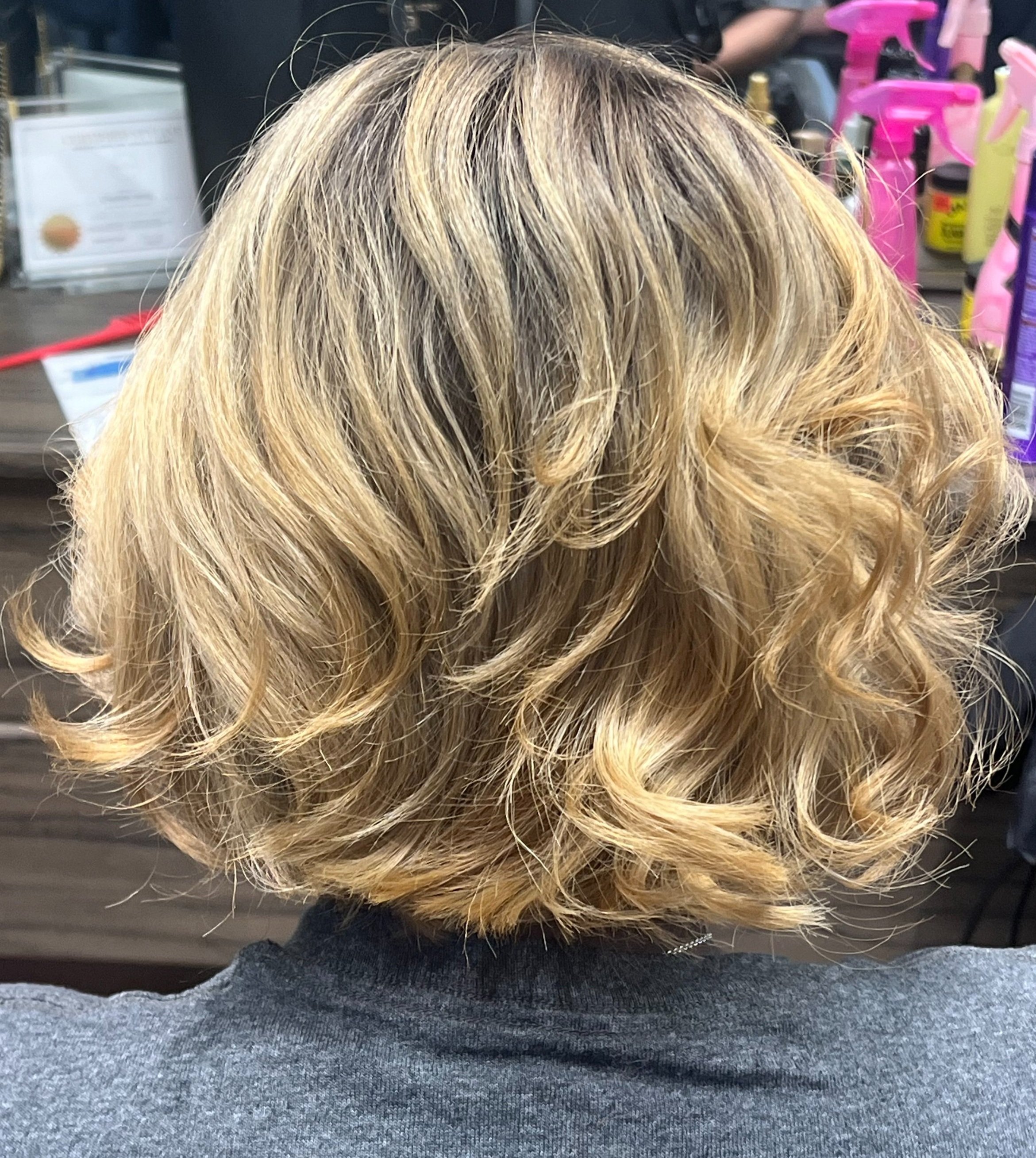 girl with short blonde hair and highlights