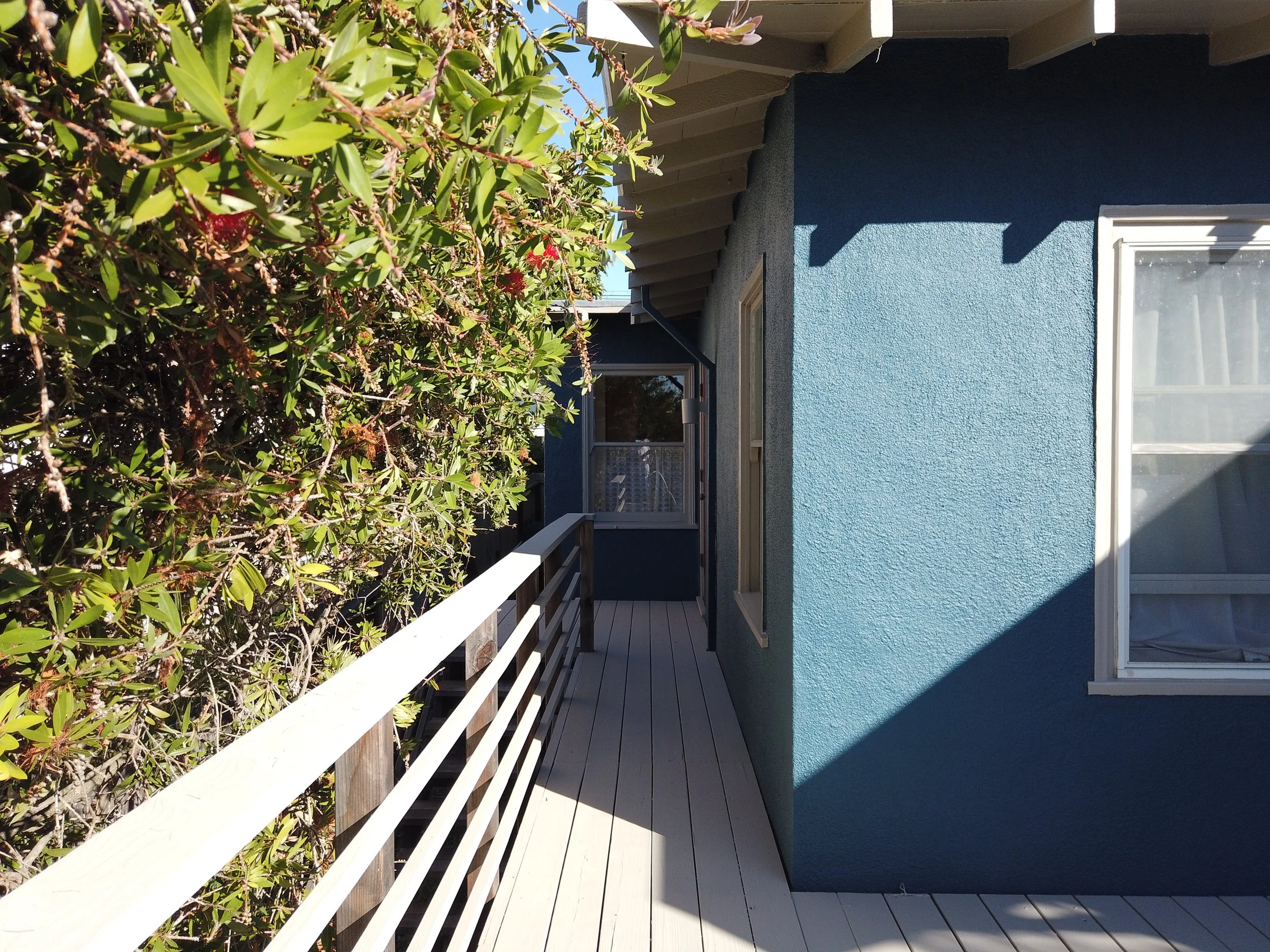 Professional exterior painting of a residential home with detailed trim and siding in Berkeley, CA.