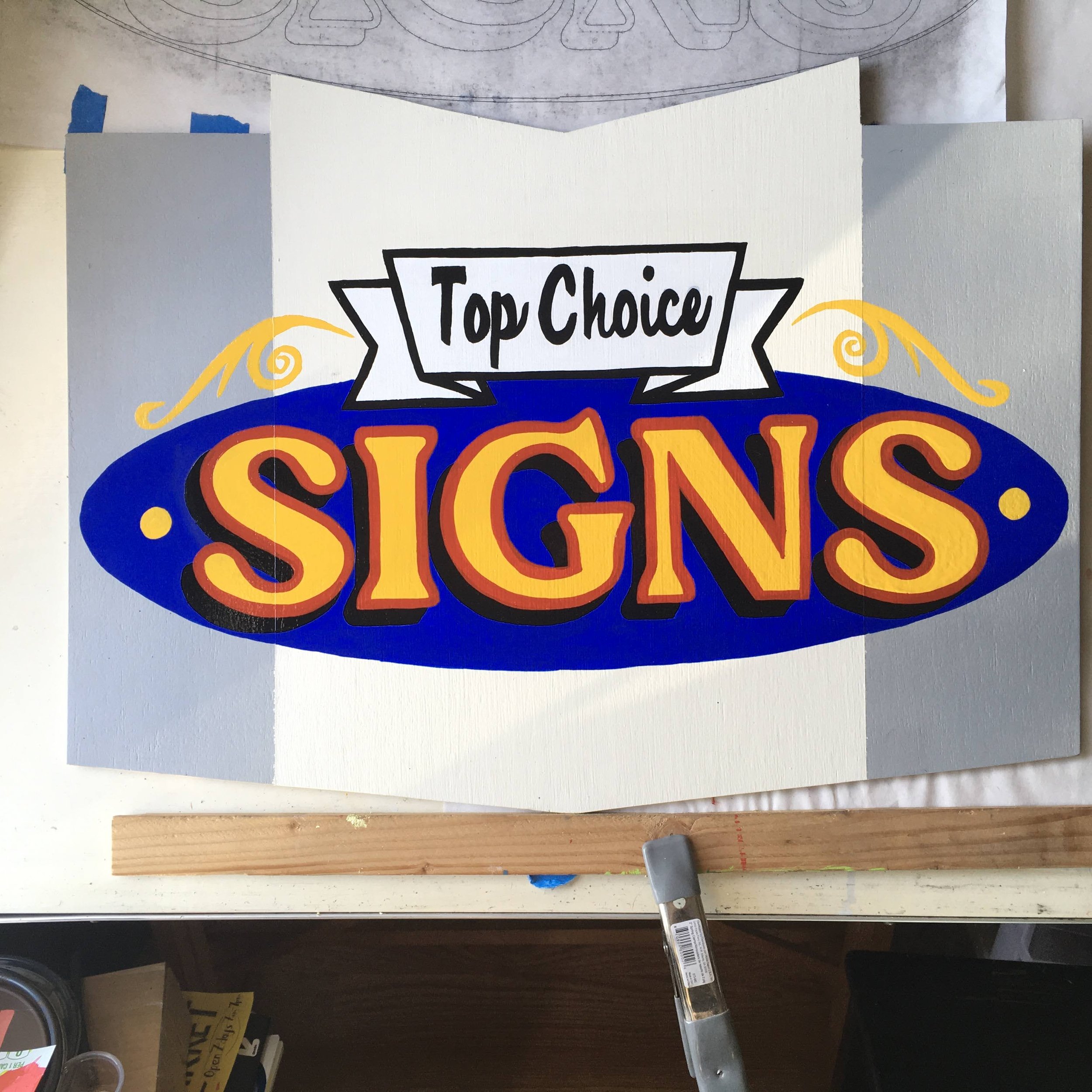 Hand-painted sign with traditional lettering techniques and durable outdoor finish in Oakland, CA.