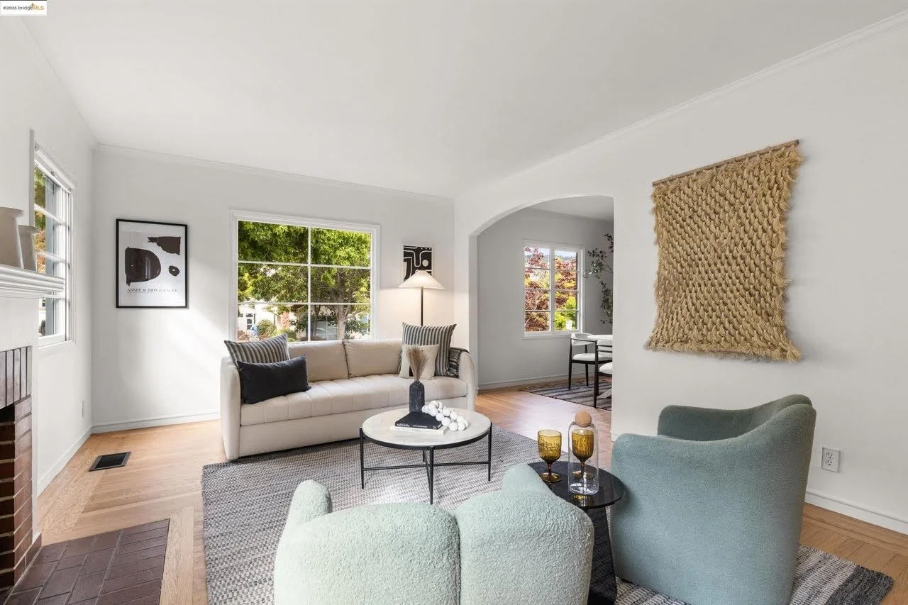 The ceiling, walls, and trim got a fresh coat of white paint in this living room in the Oakland Hills.