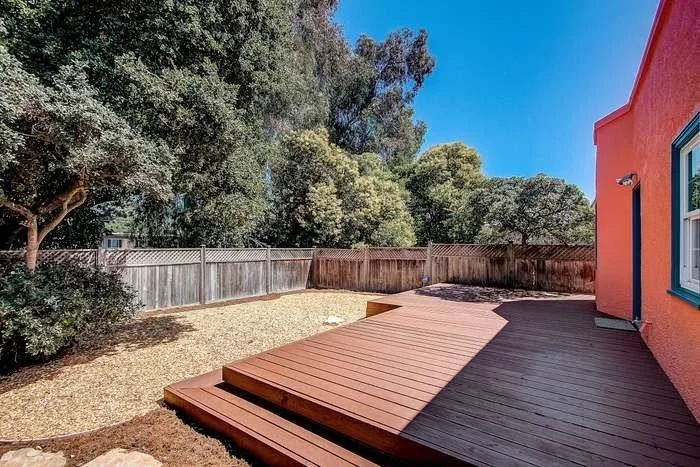 Residential exterior repaint with smooth siding coverage and clean trim lines in the East Bay.