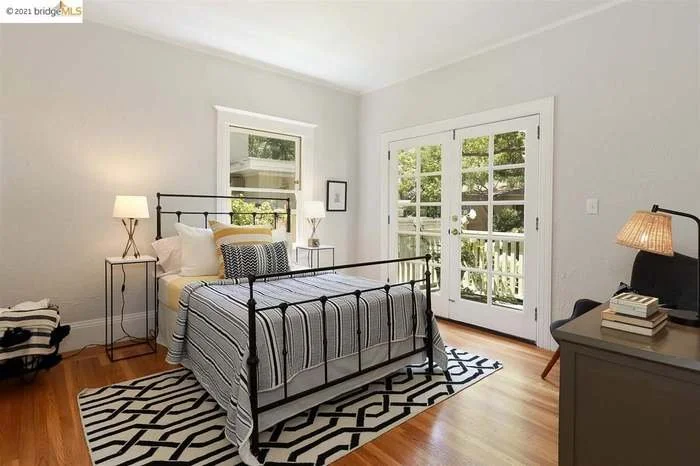 A fresh coat of paint was applied to the trim, the ceiling, and the walls in this bedroom located in Piedmont.