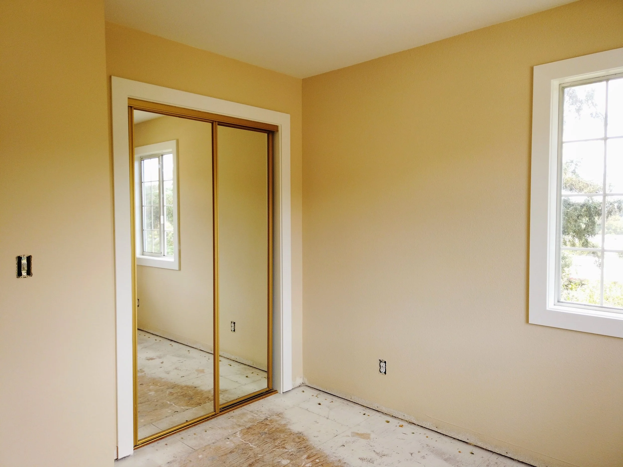 A fresh coat of paint was applied to the trim, the ceiling, the doors and the walls in this bedroom for a rental property located in the Dimond district of Oakland.
