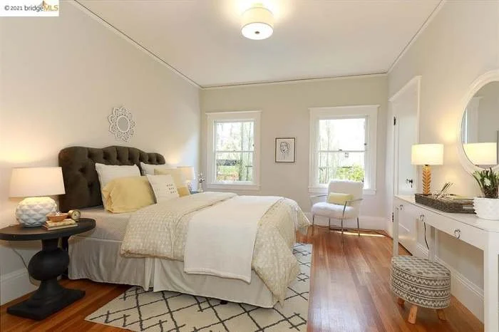A fresh coat of paint was applied to the trim, the ceiling, and the walls in this bedroom located in Piedmont.