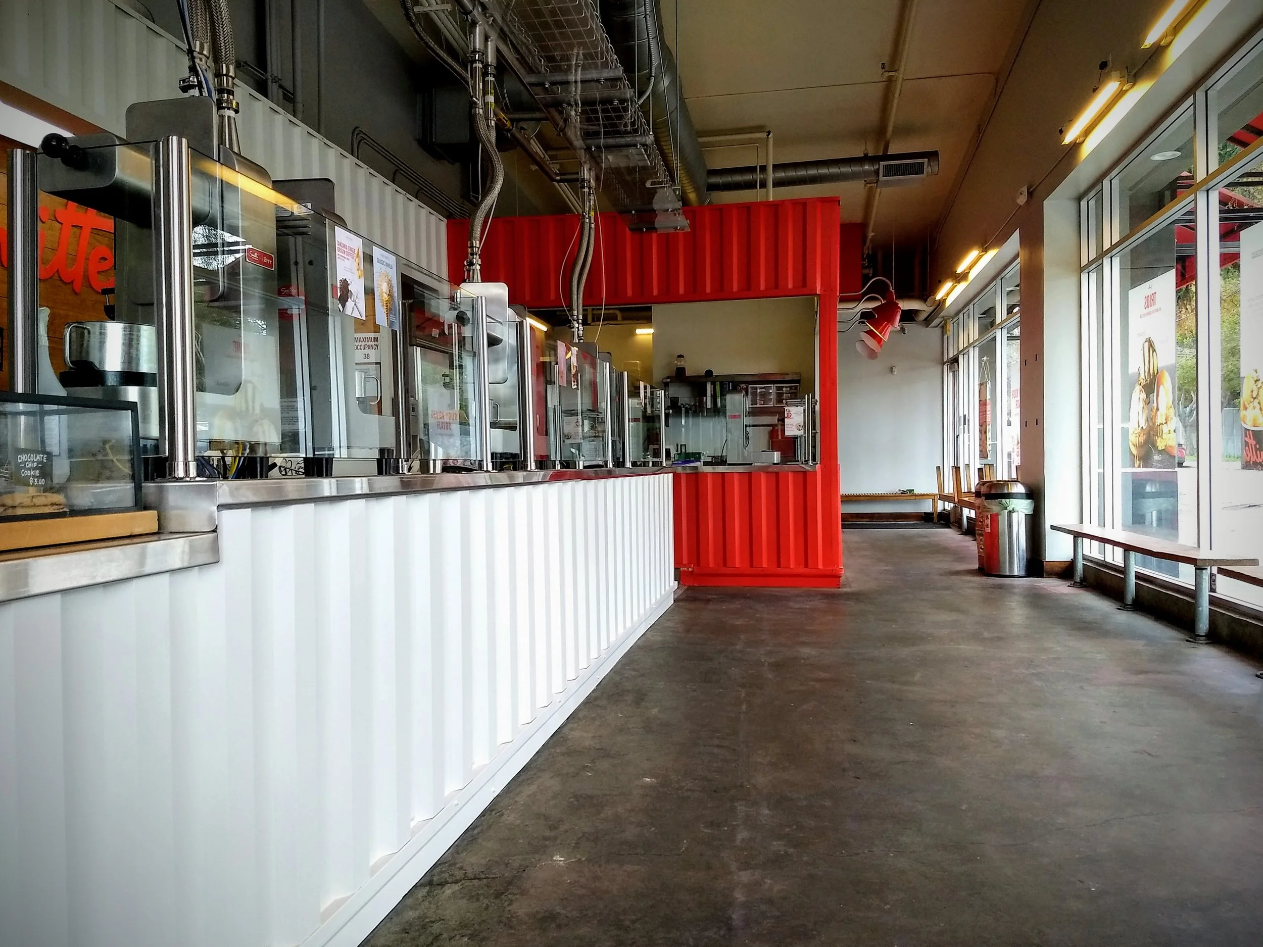 interior of commercial restaurant with newly painted metal storage units 