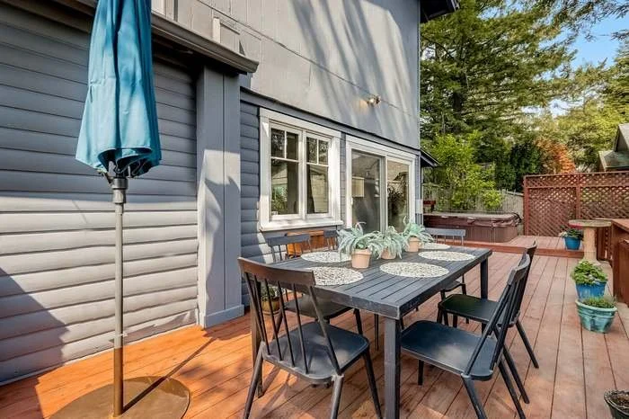 Exterior house repaint with fresh siding and trim paint completed in Oakland, California.