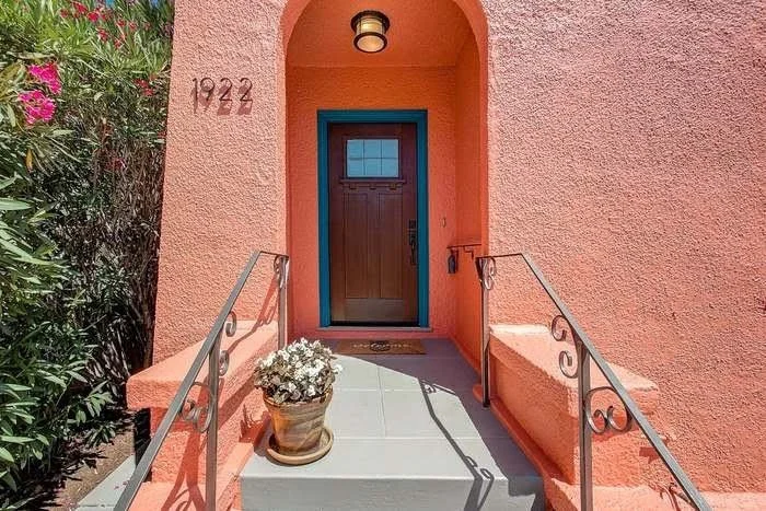 Residential exterior repaint with smooth siding coverage and clean trim lines in the East Bay.