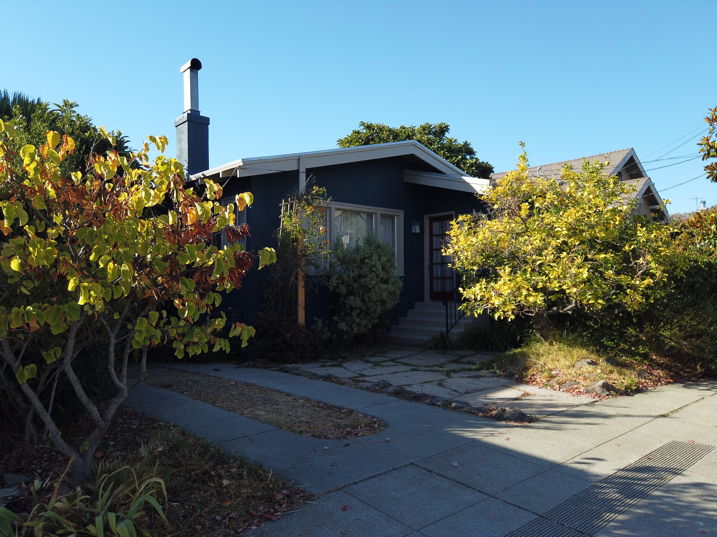 Professional exterior painting of a residential home with detailed trim and siding in Berkeley, CA.