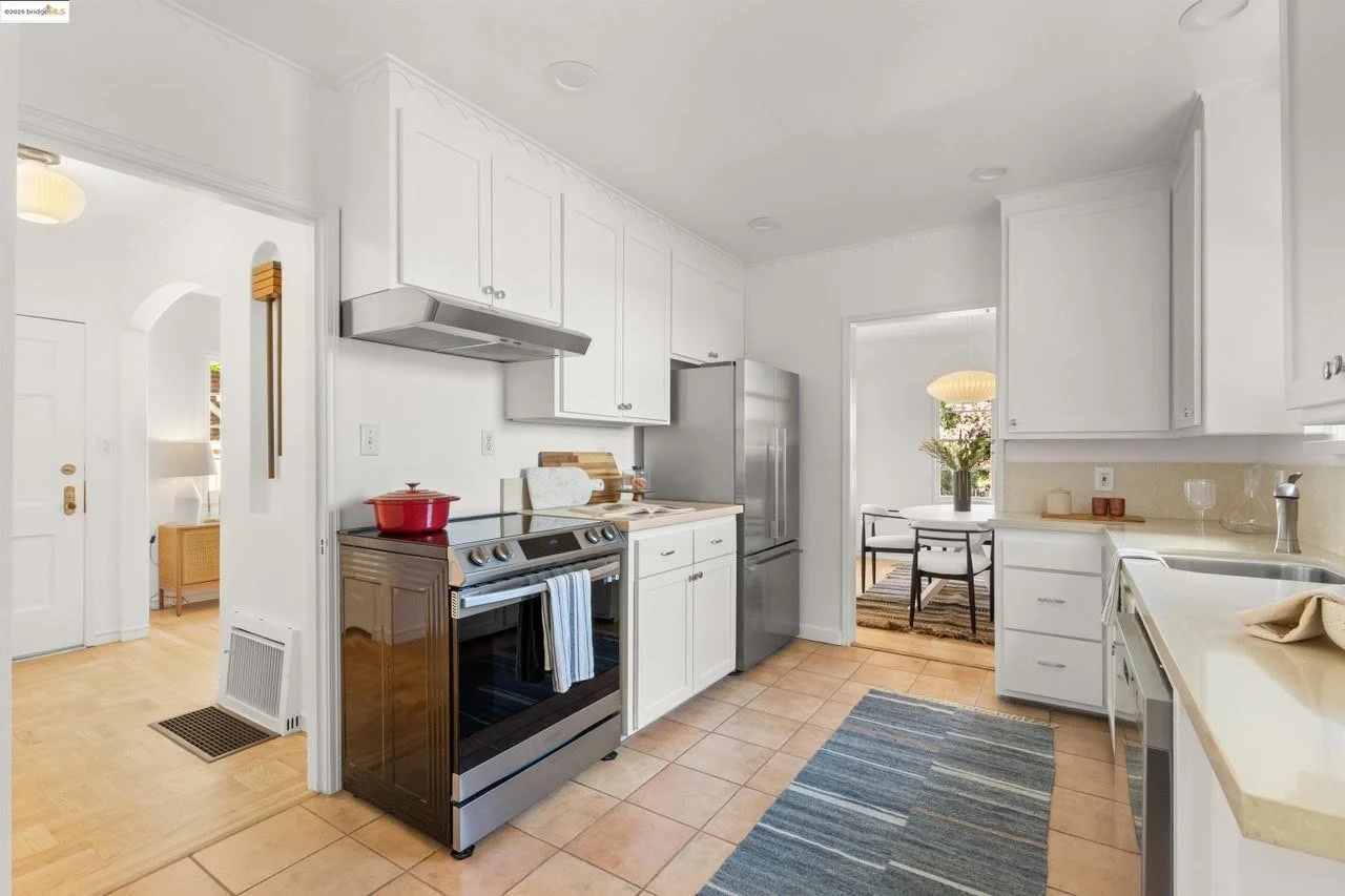 Durable paint was applied to the ceiling, walls, and trim in the kitchen located in the Oakland Hills. Cabinet paint was applied using an airless sprayer.