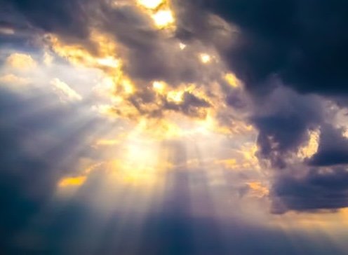 sun beams in the clouds
