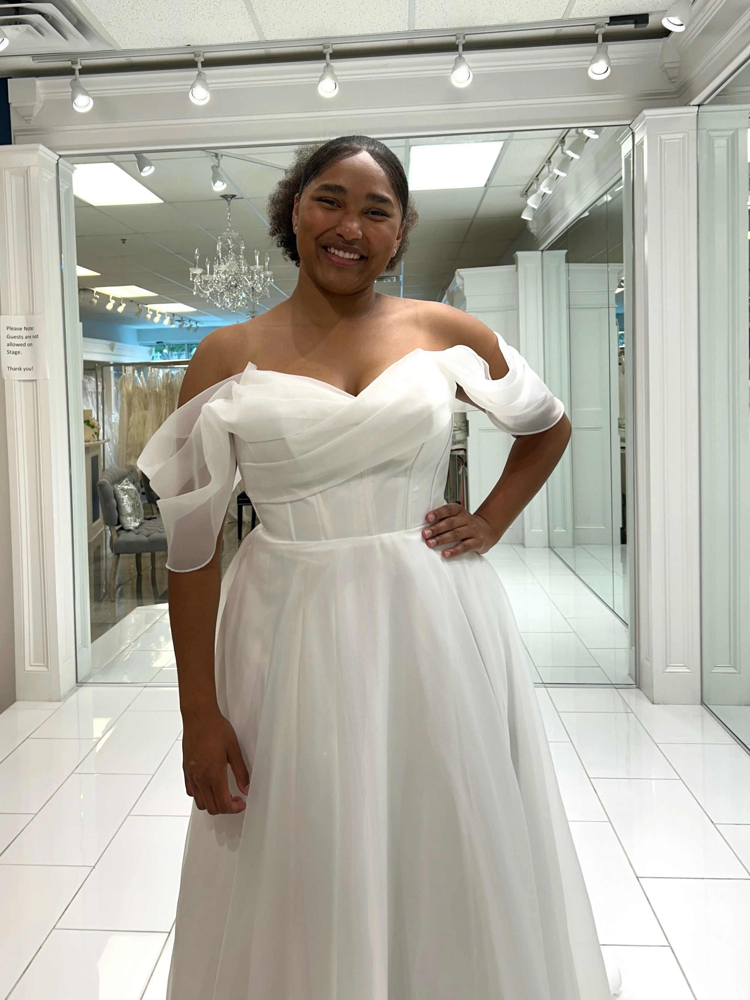 This stunning organza ball gown features an elegant V neckline, and the most romantic off the shoulder sleeves for a timeless bridal look ☺️🤍 From the moment you try on this dress, you&rsquo;ll feel so elegant 💖
.
.
.
#nataliesbridalsbybb #weddingd