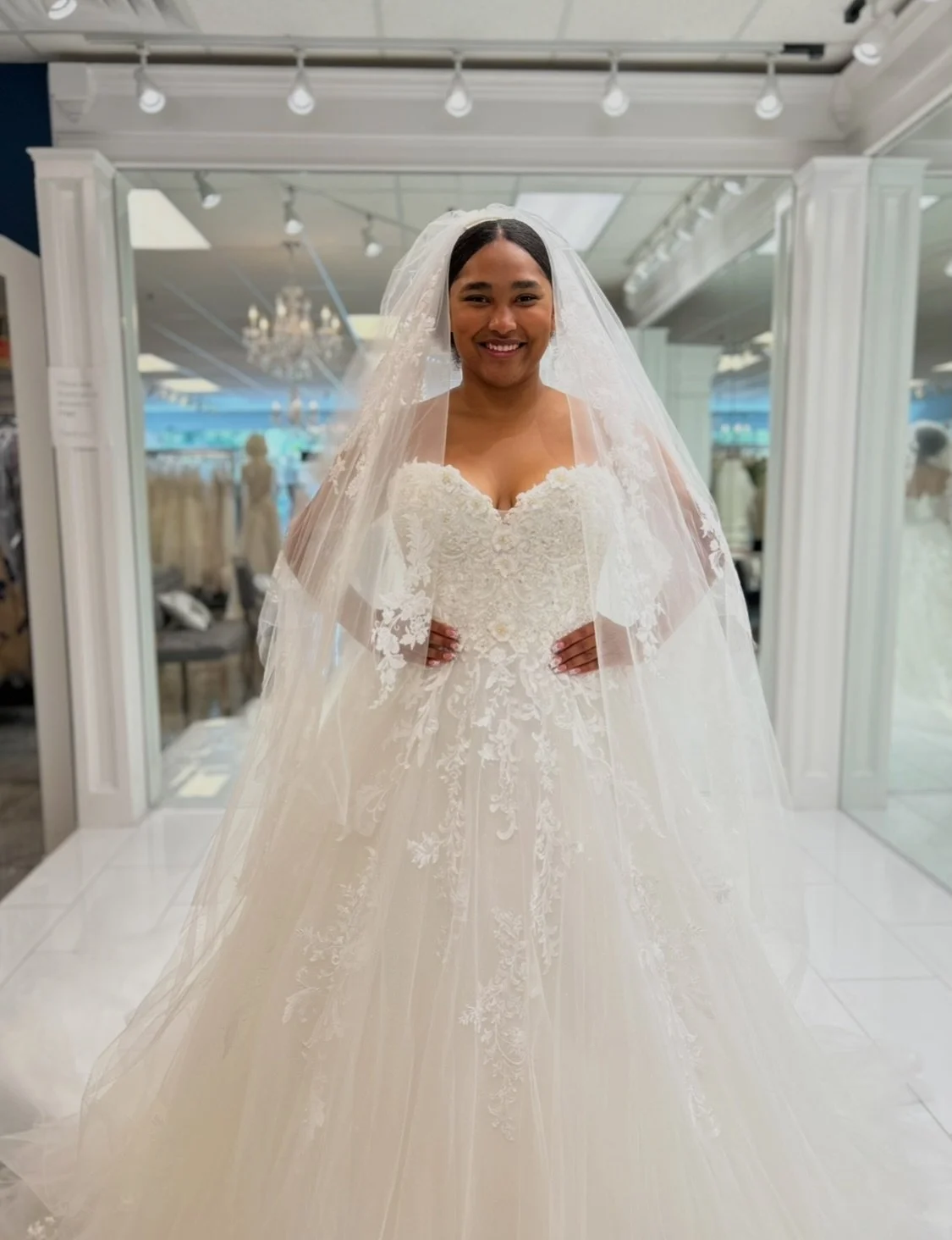 We&rsquo;re absolutely swooning over this dreamy bridal look from head to train 😍 The lace, shimmer, and the drama of the veil.. what&rsquo;s not to love 🥰? 
.
.
.
#nataliesbridalsbybb #weddingdress #veil #ballgown #bridalboutique