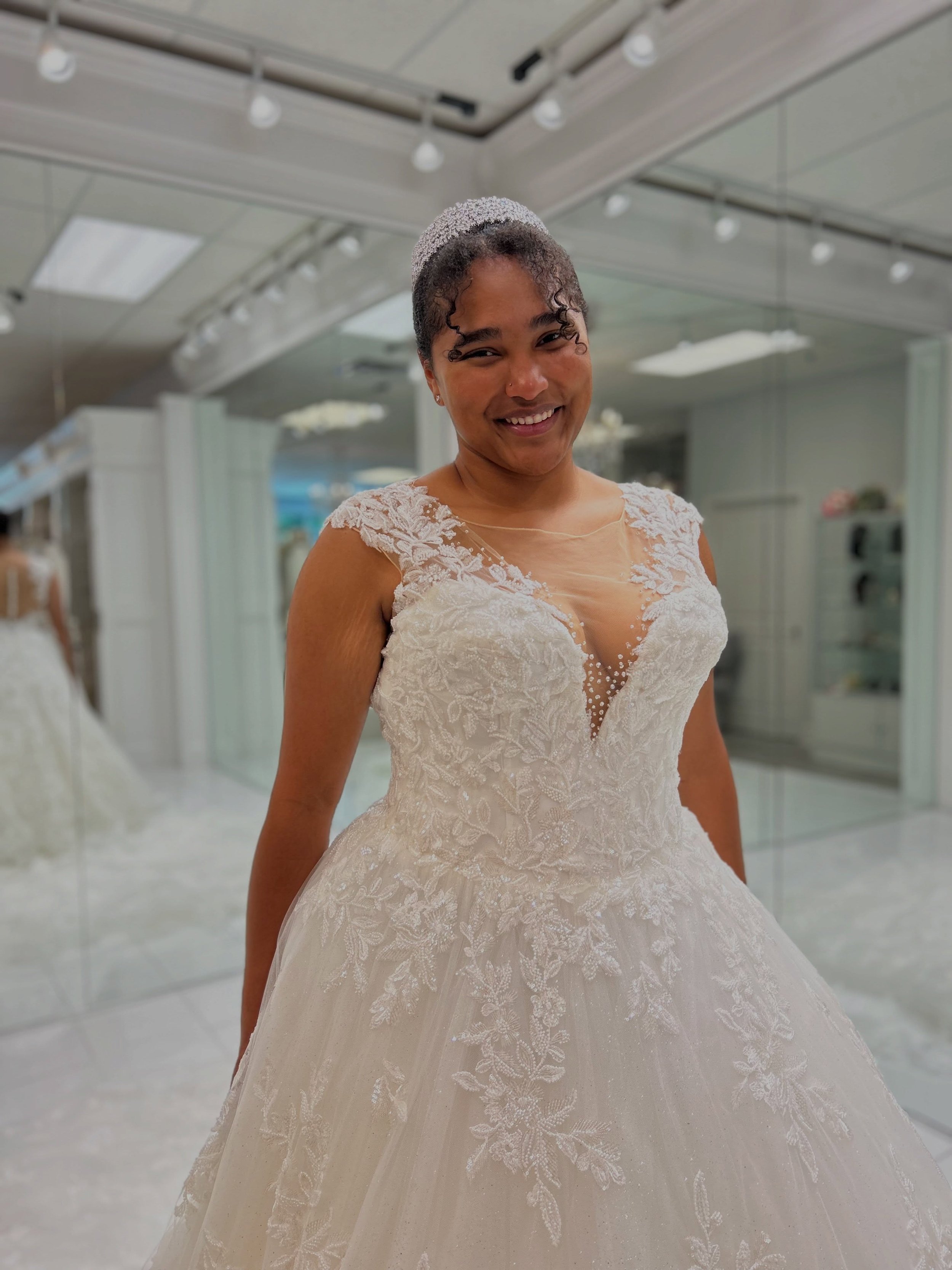 Princess worthy sparkle? We think so 🤩✨ This glimmering ball gown combines romantic beaded lace, elegant cap sleeves, and a sparkling train that&rsquo;s guaranteed to make an entrance 🥰
.
.
.
#nataliesbridalsbybb #weddingdress #ballgown #weddingdre