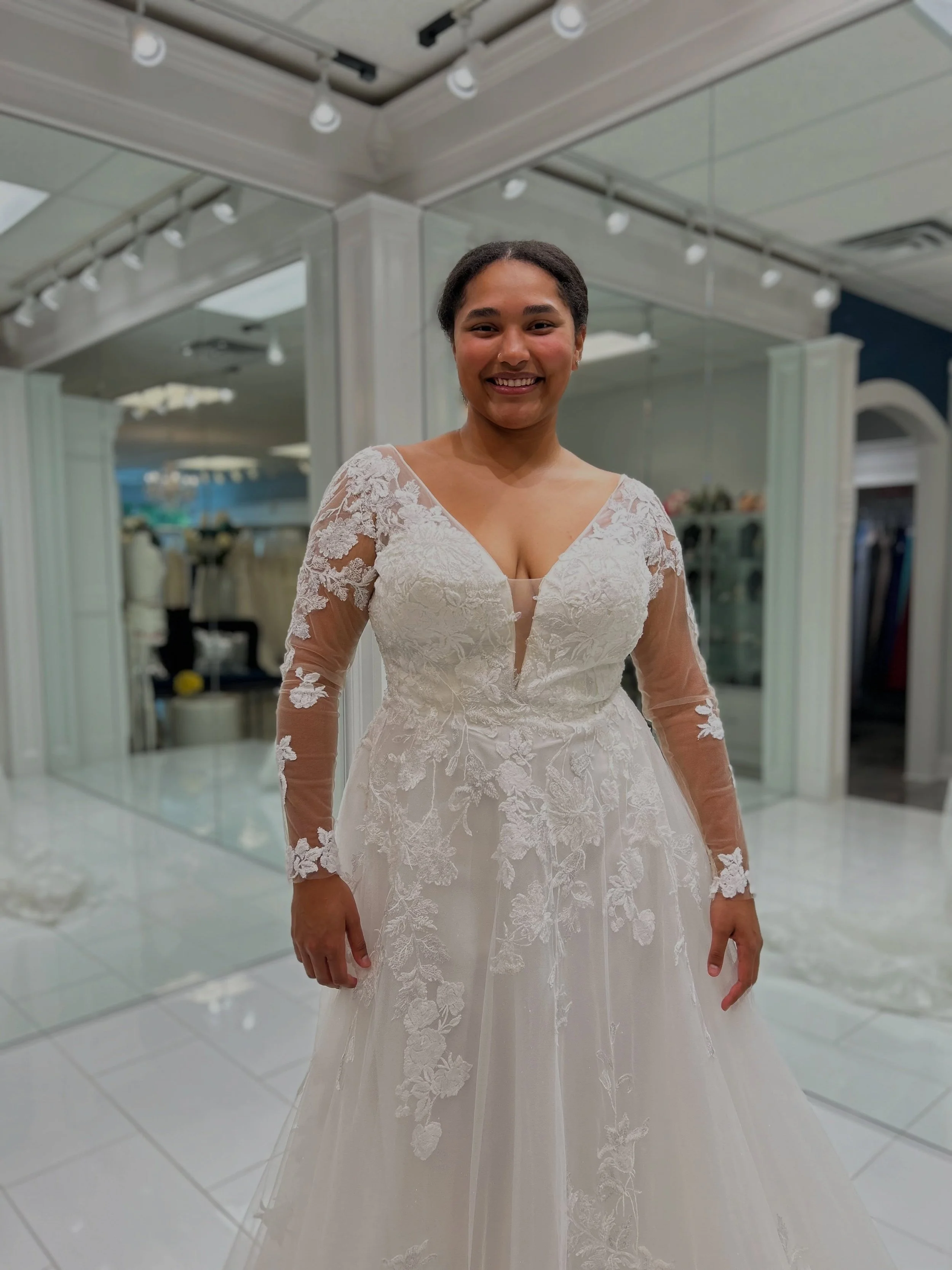 This romantic A-line is gorgeous from every angle and wait until you see the train 👀💕 Delicate lace, dreamy sparkle tulle, and infinity buttons that down the train 😇 Could this be your dream dress? Come find out at Natalie&rsquo;s Bridals 🤍
.
.
.