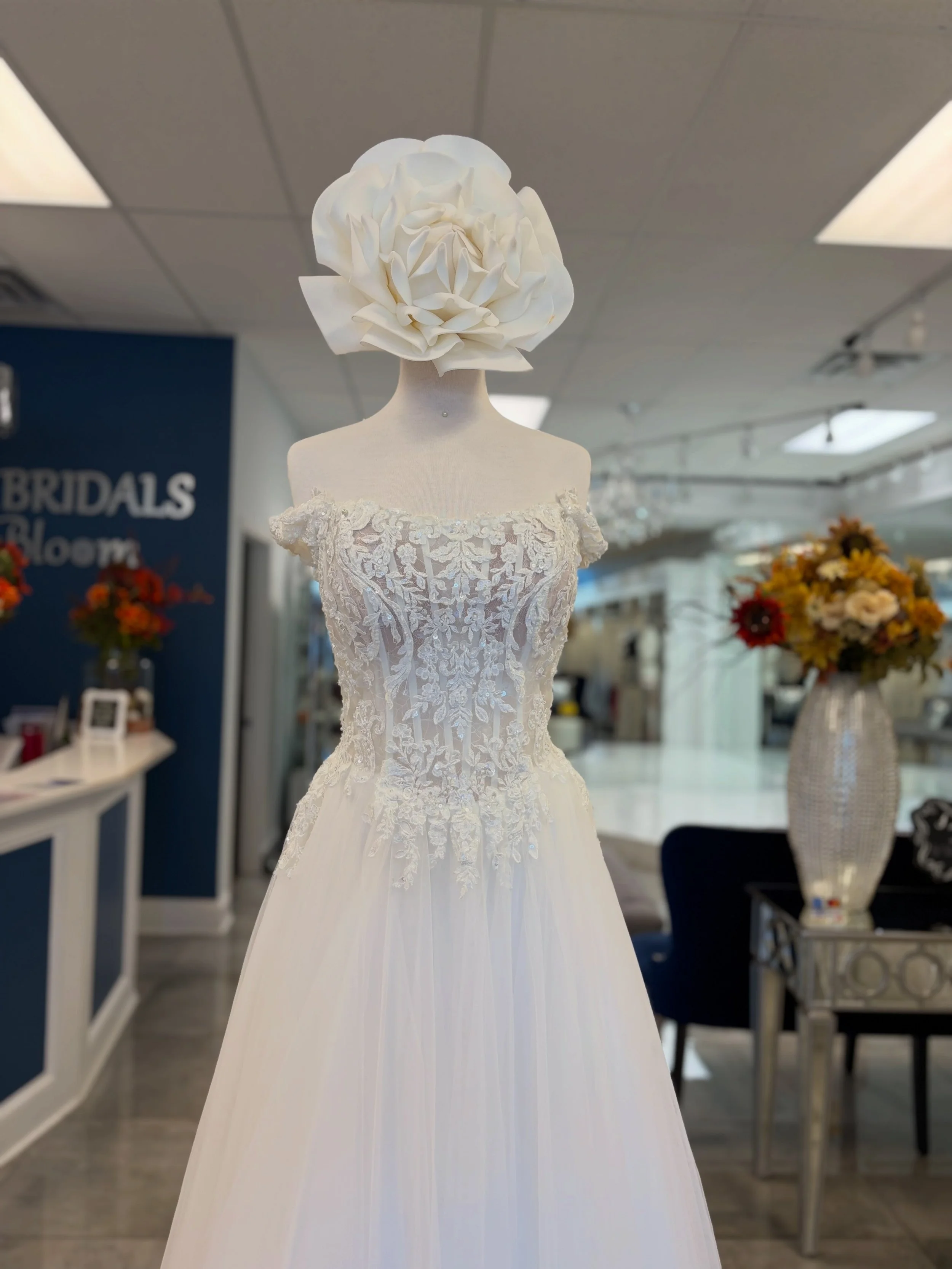 The details just keep getting better the longer you look 😍🤭 Sparkling beading, dreamy Chantilly lace, see-through corset, and that lace-trimmed train?! Simply stunning ❤️ Could you picture yourself walking down the aisle in this beauty 👀? Book you
