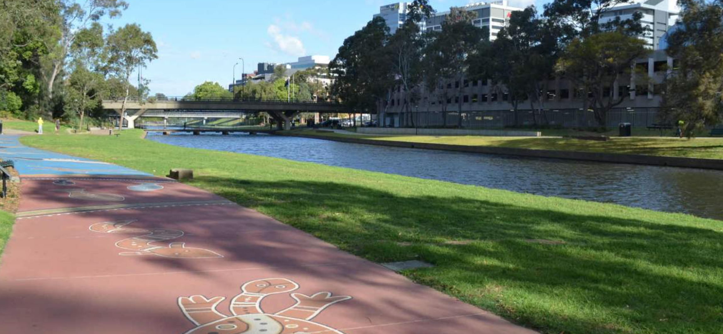 A path with indigenous artwork along the Parramatta River and Parramatta city