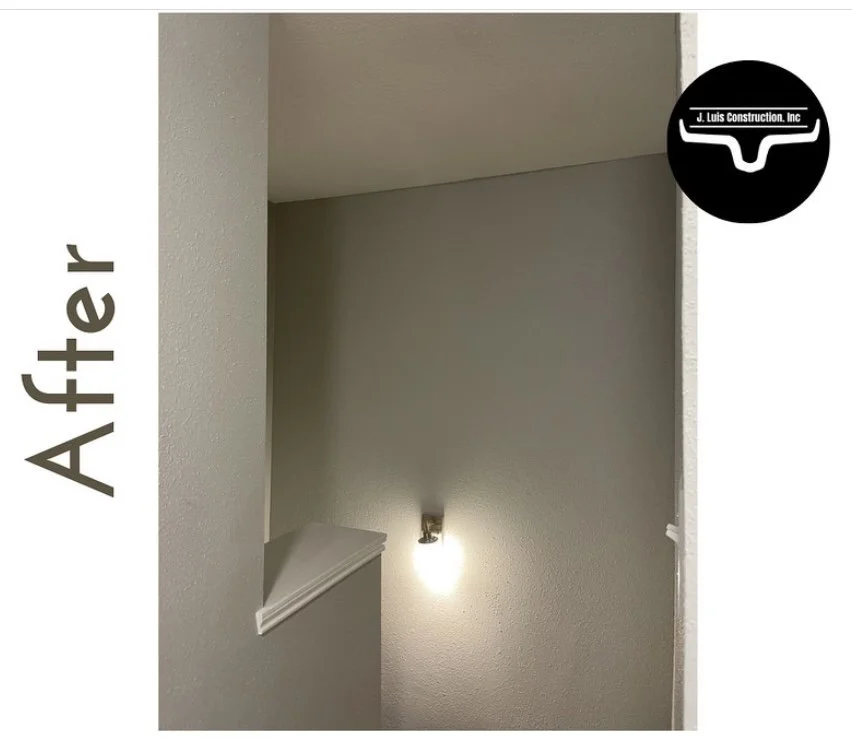 Interior staircase wall with fresh paint and a lit wall sconce, accompanied by the word 'After' and a construction company logo.