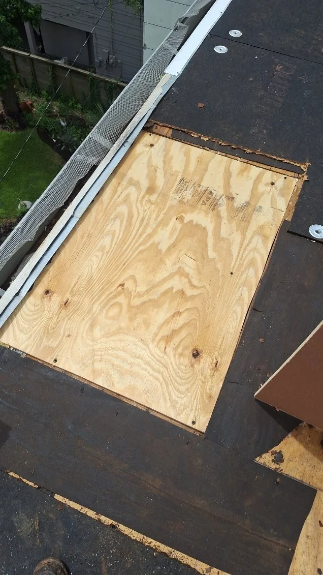 Roof repair with plywood patch and underlayment