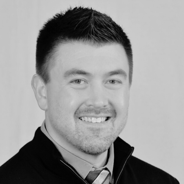 Black and White headshot of Matthew Collar, Senior Director of National Accounts of Proud Impact Collective