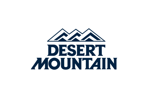 Logo with stylized mountain peaks above the text 'Desert Mountain'
