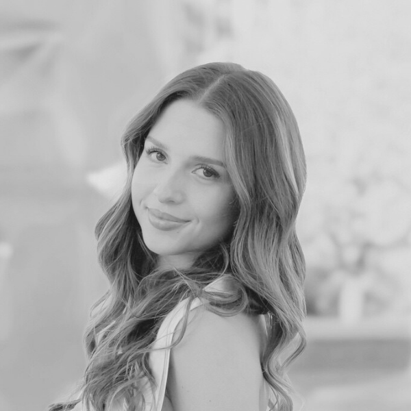 Black and White headshot of Sydney Antezana, Account Manager of Proud Impact Collective