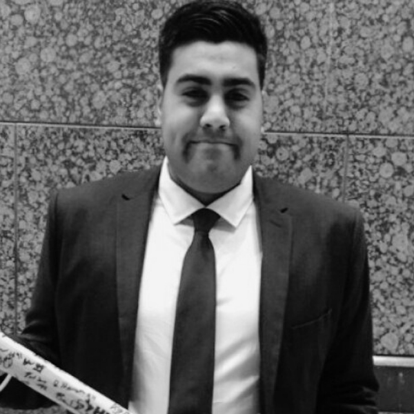 Black and White headshot of Vijay Singh, Account Manager of Proud Impact Collective