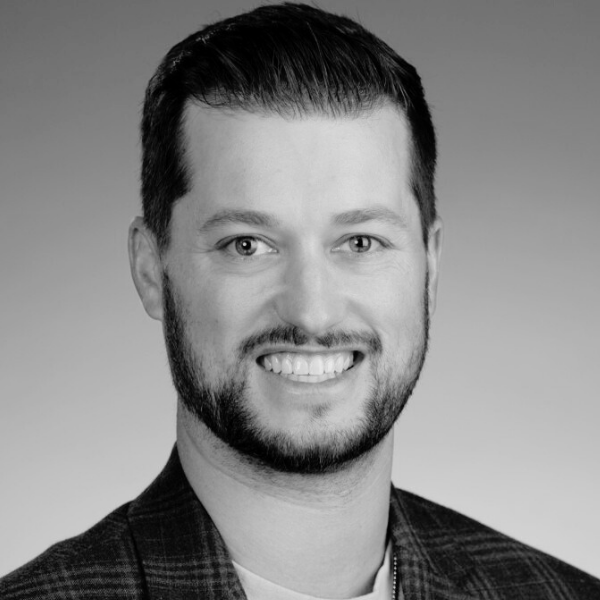Black and White headshot of Cole Pennington, Co-Founder and President of Proud Impact Collective