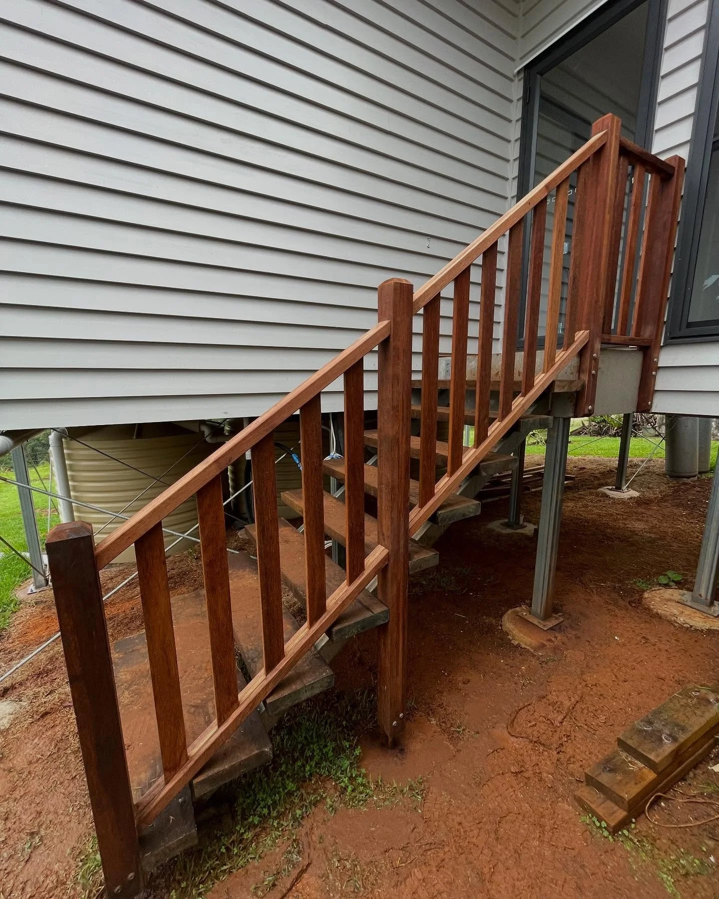 We installed Stairs and Balustrade this week in the rain and mud.