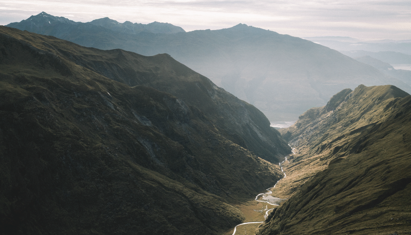 An image of the mountains with a graphic moving over the top
