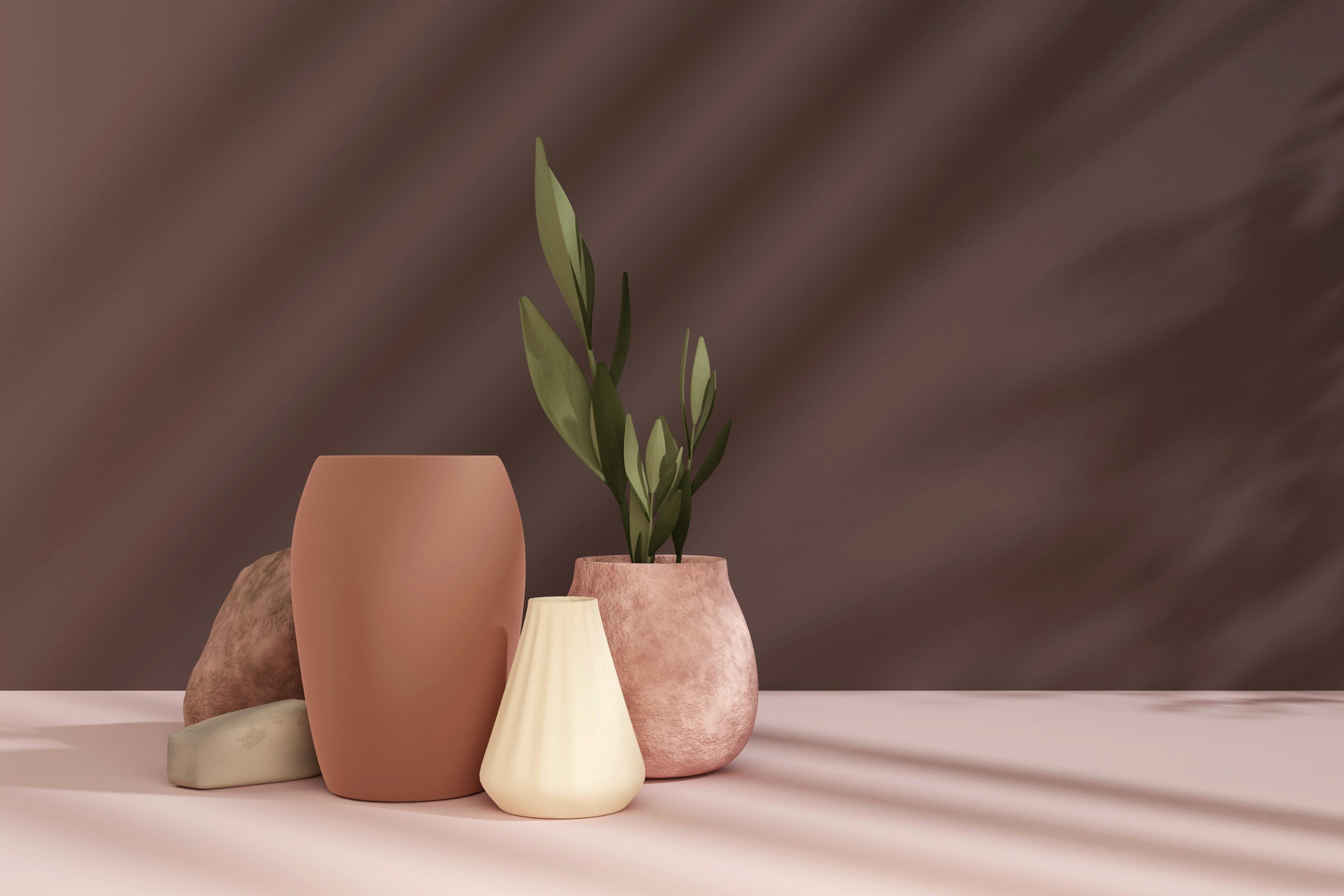 Set of four vases with different shapes and colors, one containing green leafy plant, on a pink surface with a brown gradient background.