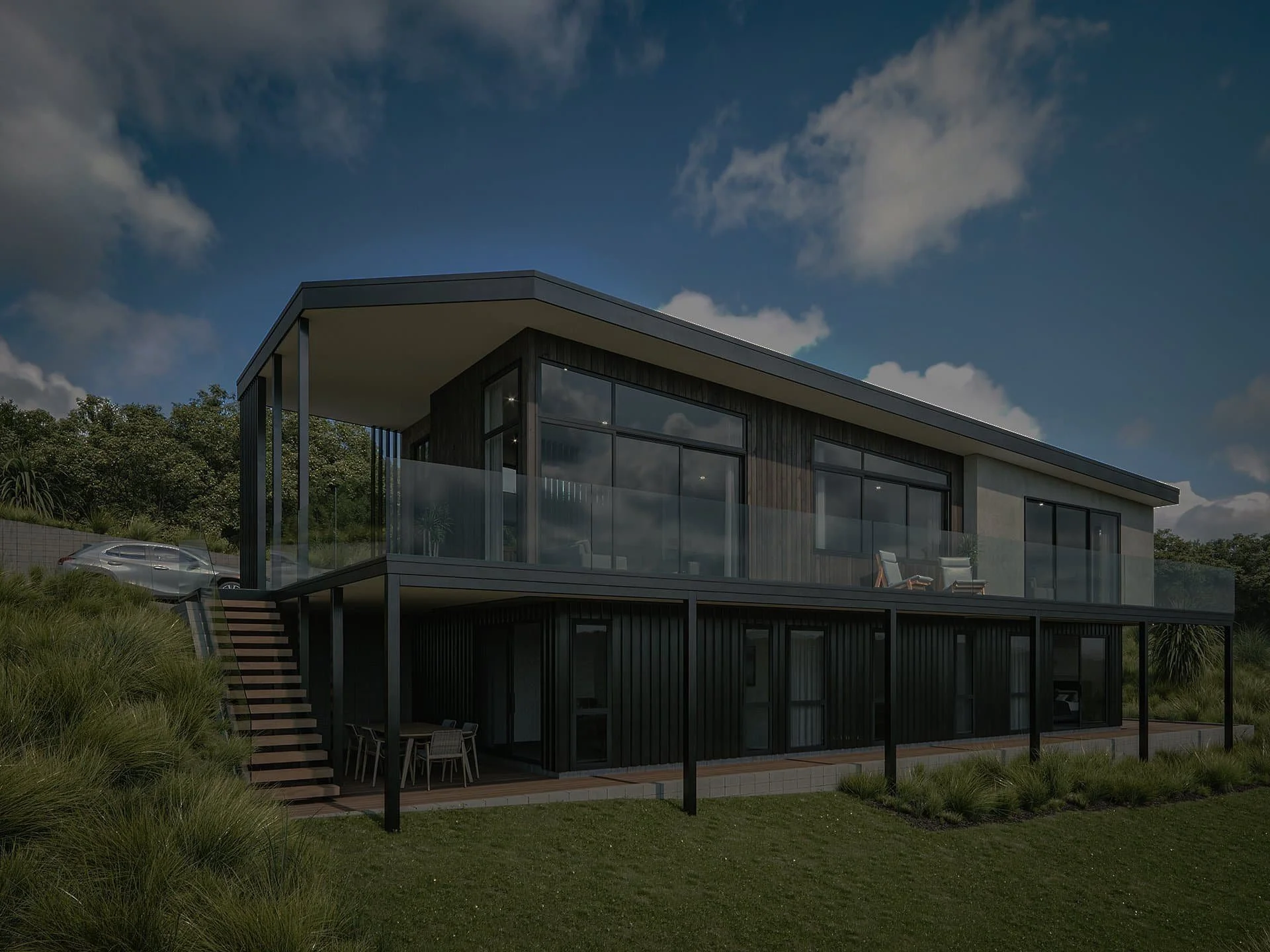Modern two-story house with large glass windows and a balcony, surrounded by greenery and a car parked on an incline.