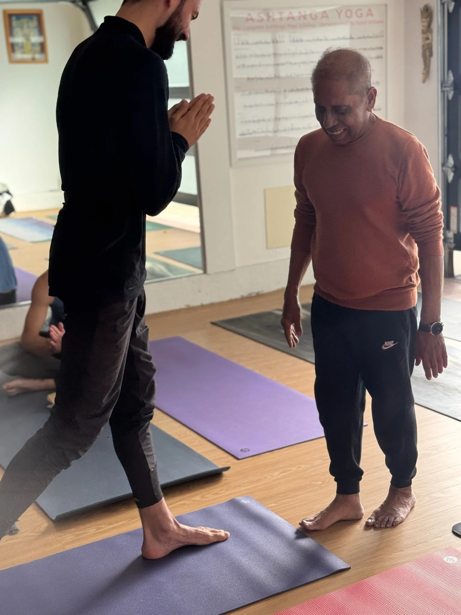 Manju P. Jois sharing Yoga Therapy assist with Caio Amaral, Encinitas, California