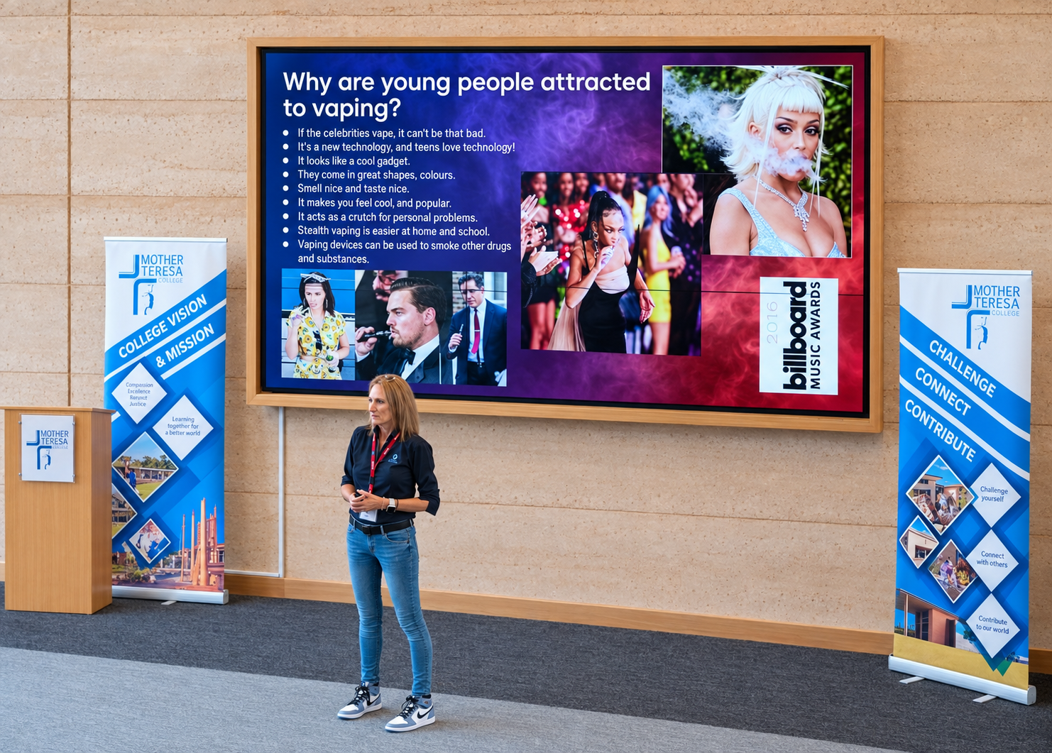  Azelene Williams in front of a large screen displaying a presentation about why young people are attracted to vaping. 