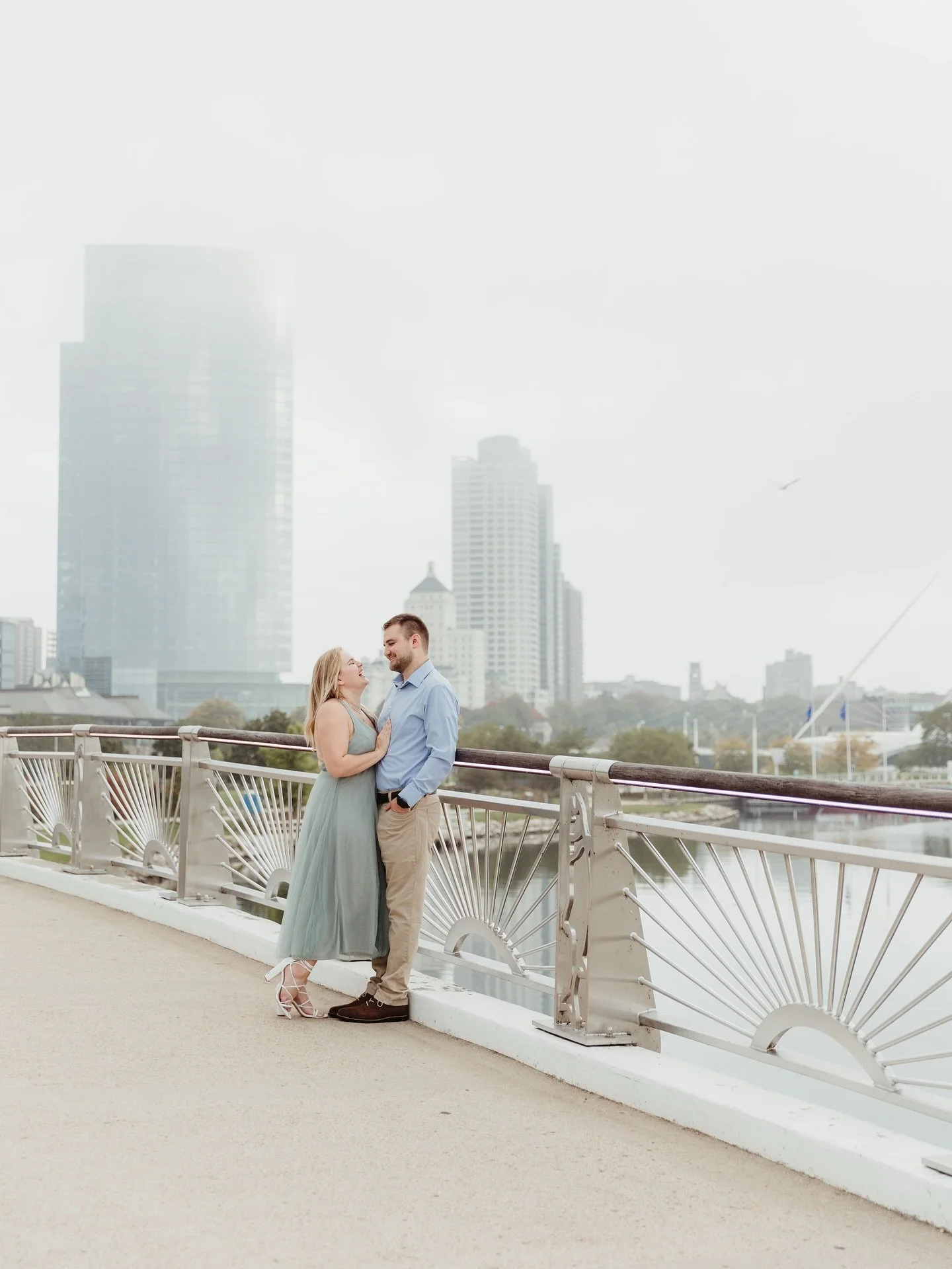 It was super foggy by my house this morning. Made me think about this engagement session. We planned for sunrise, got a small bit of sunlight and had fog throughout the rest of the session. It turned out to be gorgeous! The dress, the couple, the cit