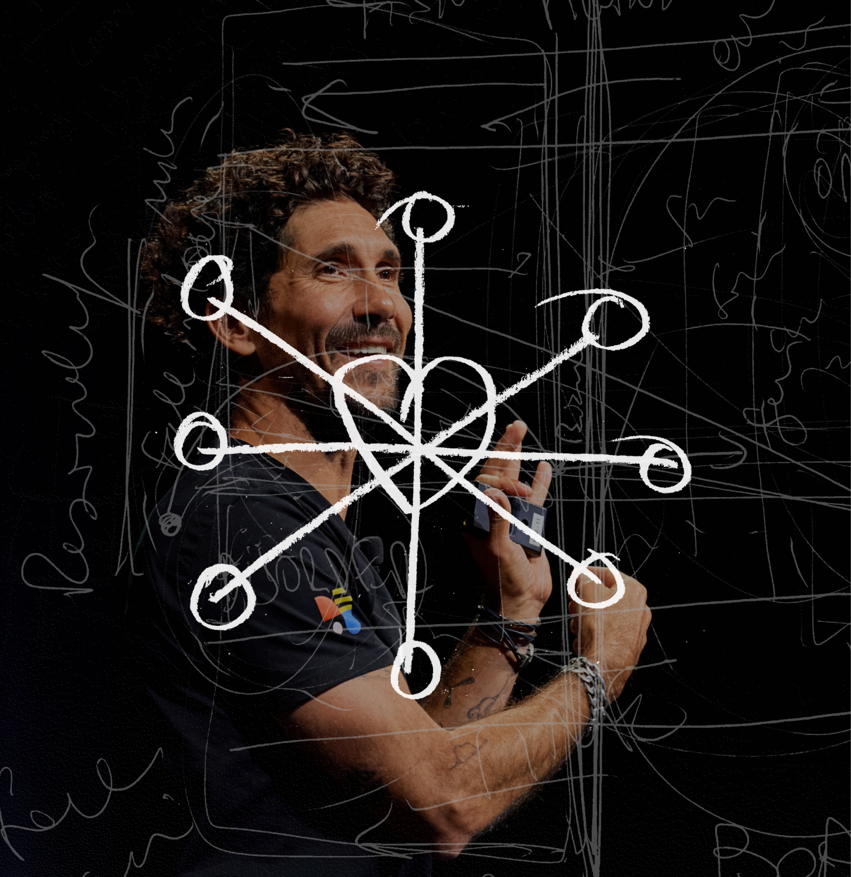Gus Balbontin smiling mid-talk holding a clicker, with a hand-drawn network diagram of a heart linked out to circles overlaid on a dark background.