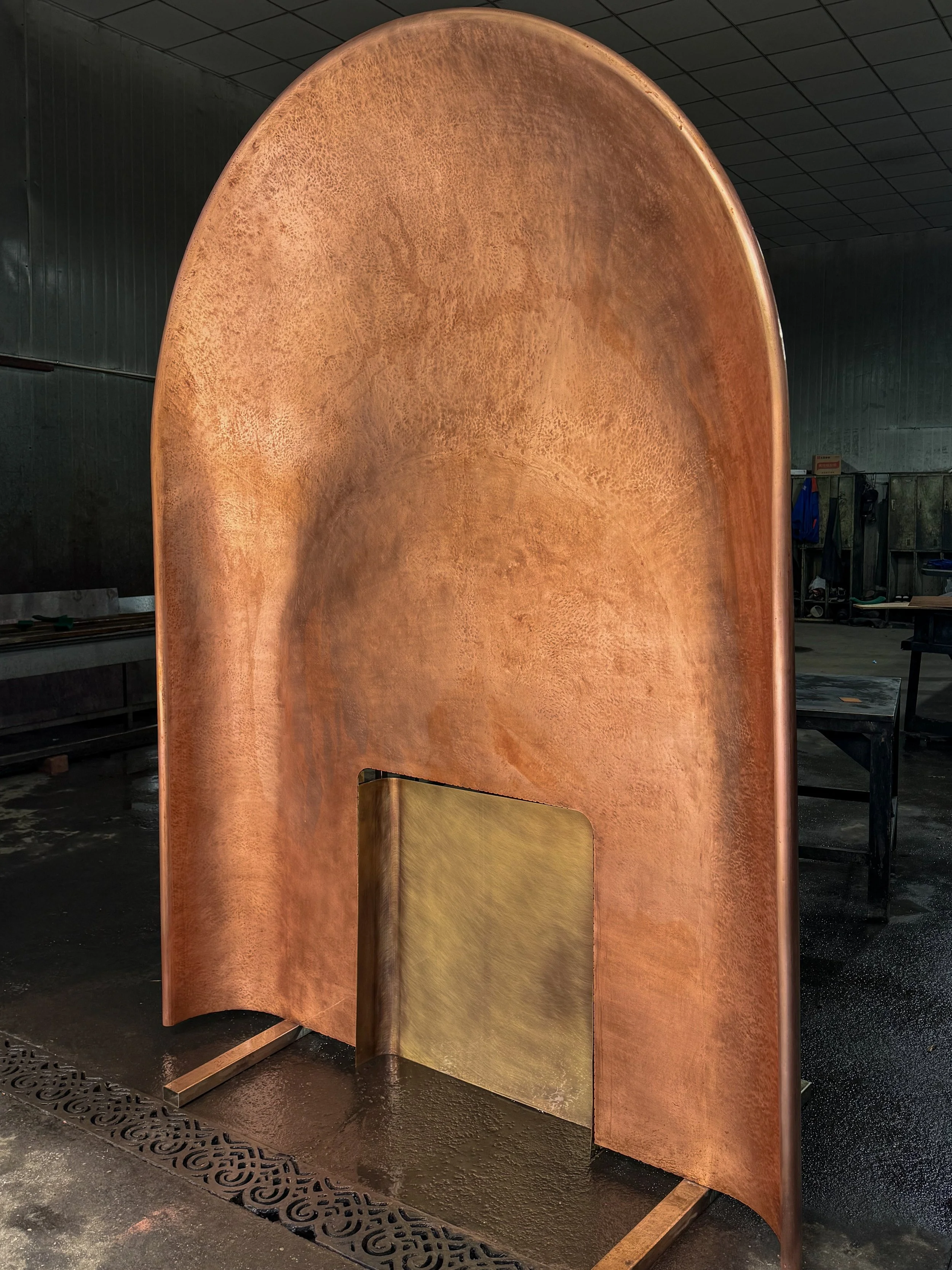Copper skinned fireplace patination