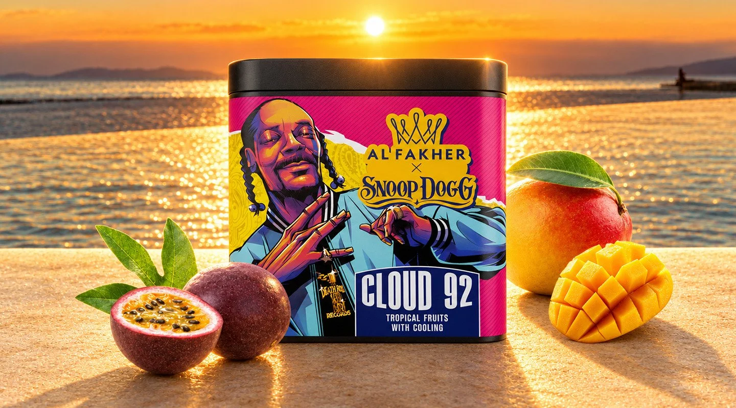 Al Fakher x Snoop Dogg Cloud 92 shisha tobacco tub with passion fruit and mango against a summer sunset.